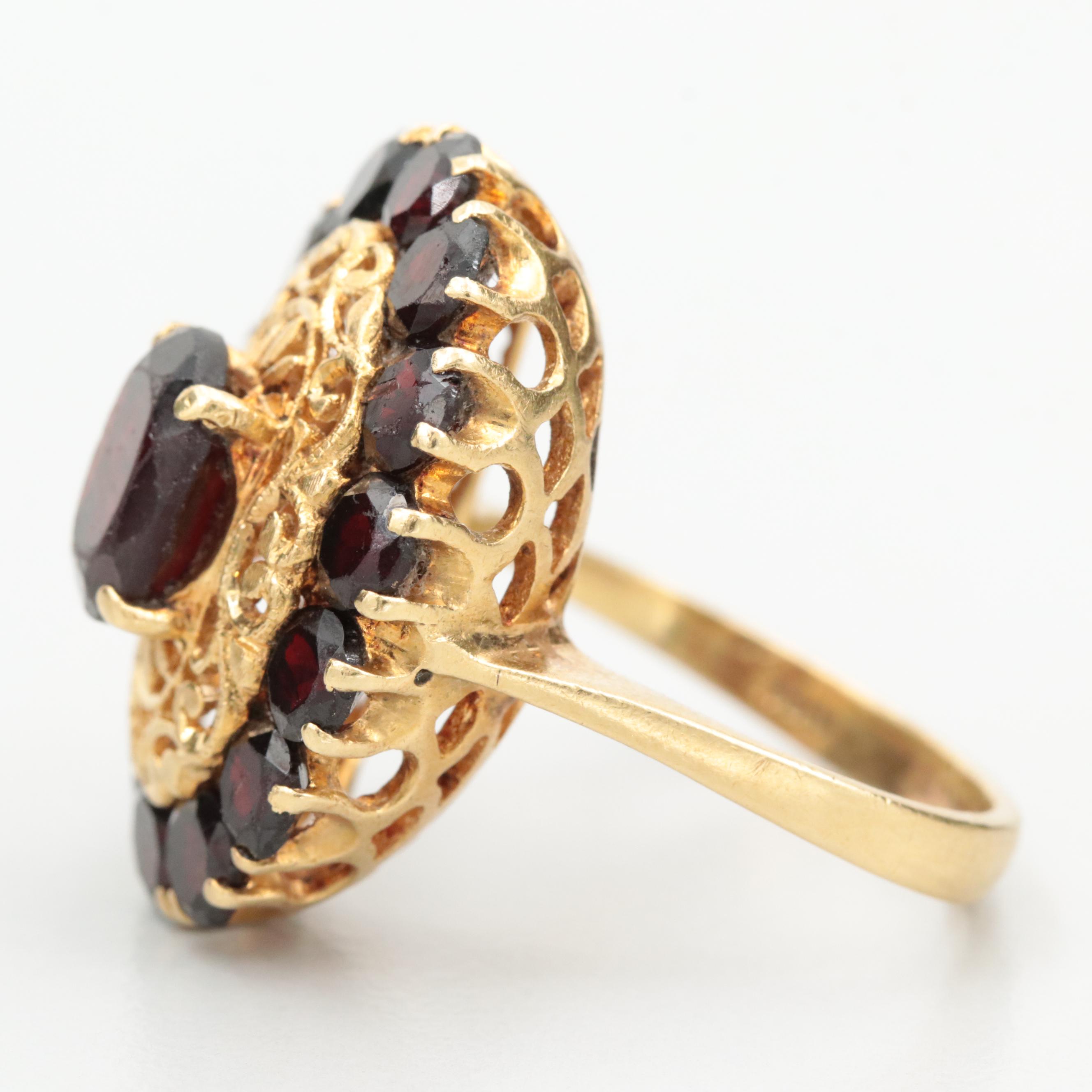 Vintage Italian 18K Yellow Gold Garnet Ring with Openwork Detail