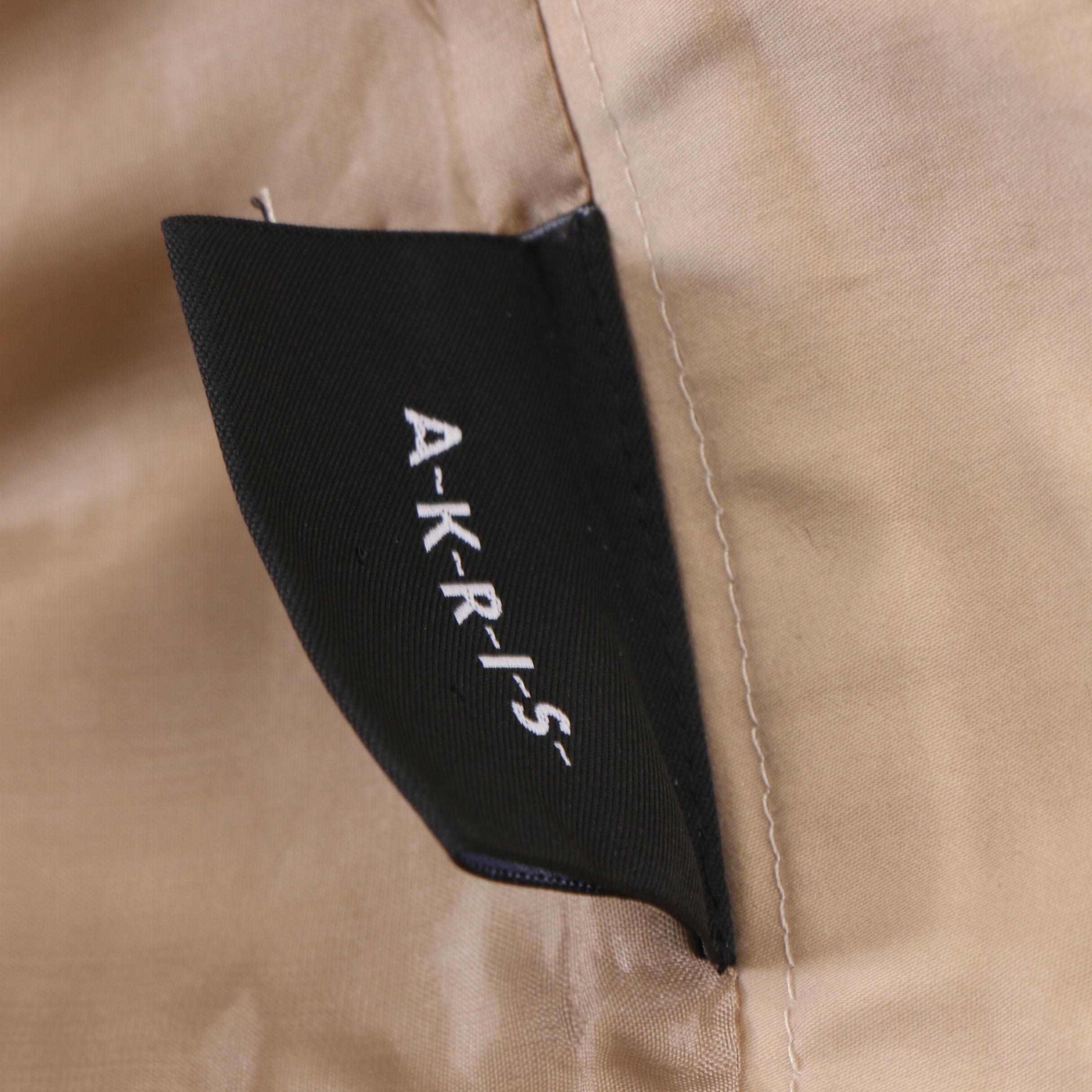 Prada Black Pencil Skirt, Stella McCartney Top, and Akris Beige Pencil Skirt