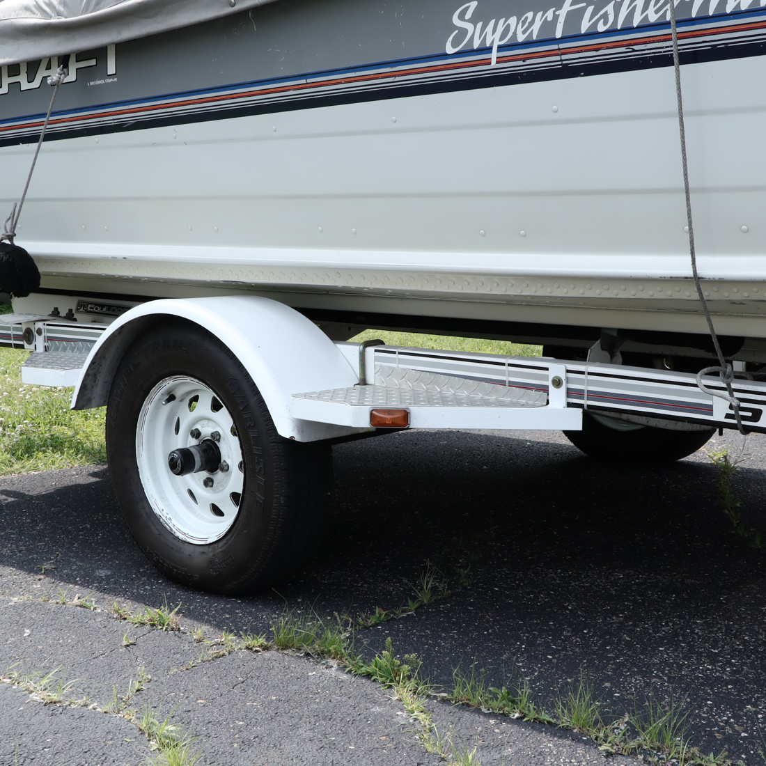 1990 16' Starcraft SuperFisherman with 60 HP Meriner Motor and Trailer