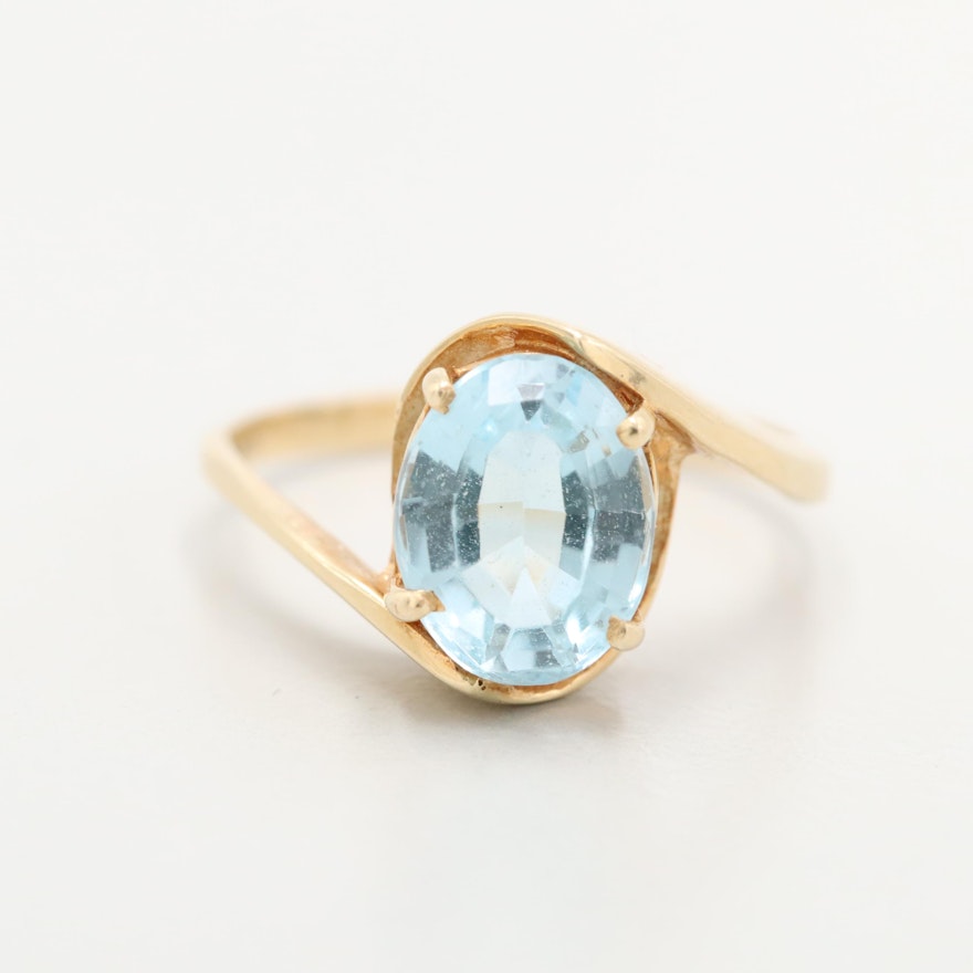 14K Yellow Gold Blue Topaz Bypass Ring