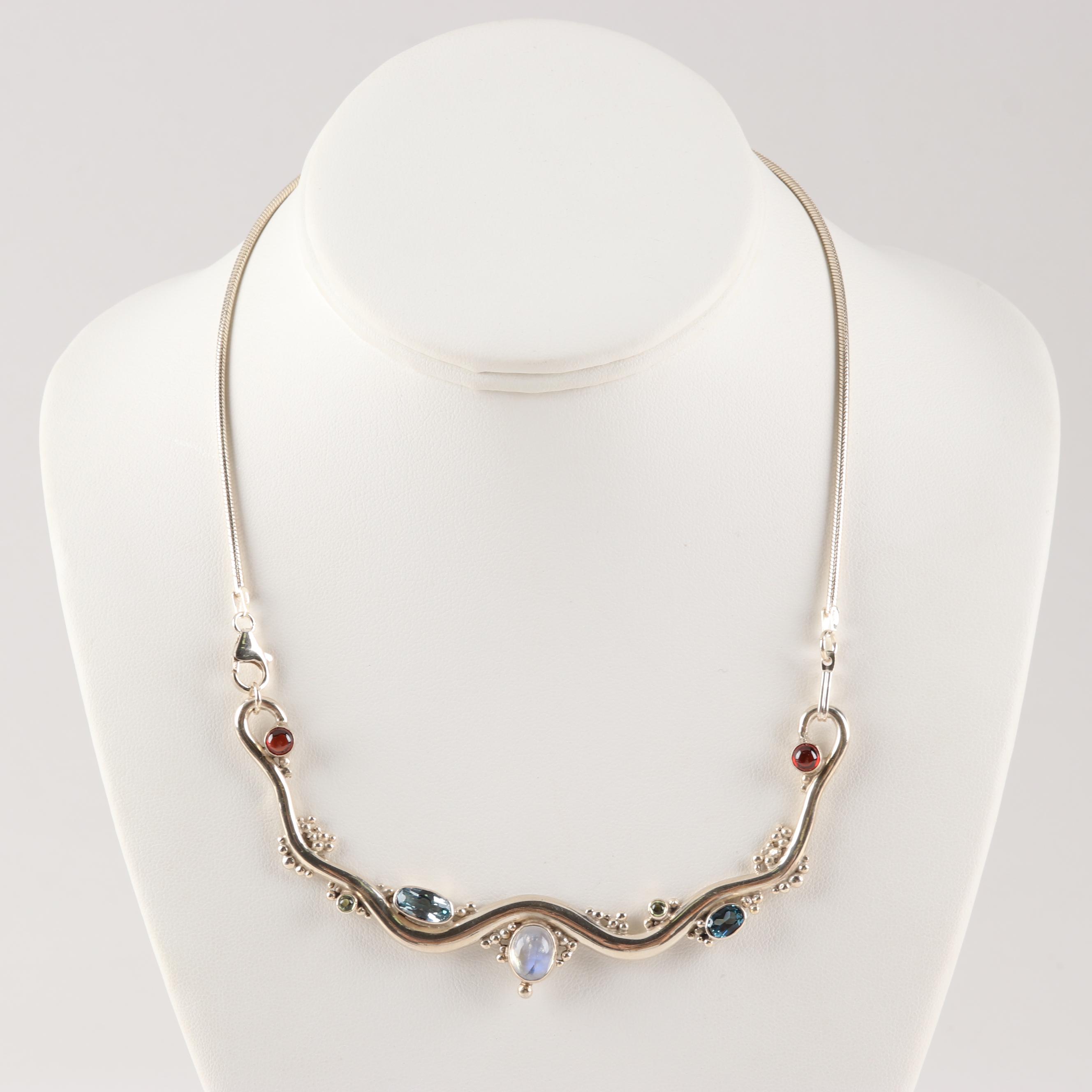 Sterling Silver 1.80 CT Moonstone 3.50 CTW Blue Topaz 1.00 CTW Garnet Necklace
