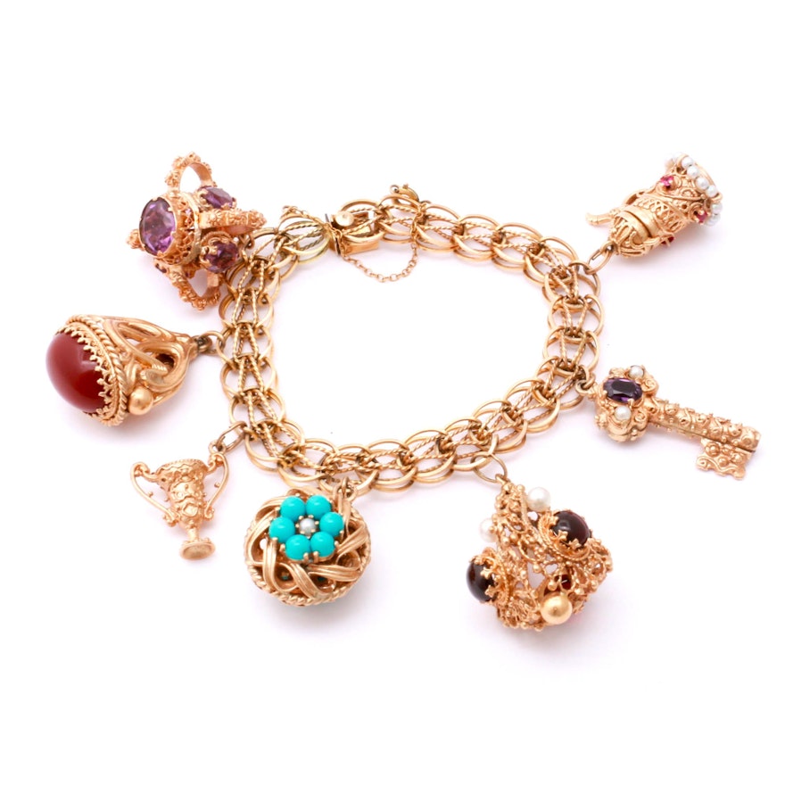 14K and 10K Yellow Gold Charm Bracelet with Garnet, Turquoise, Pearl, and More