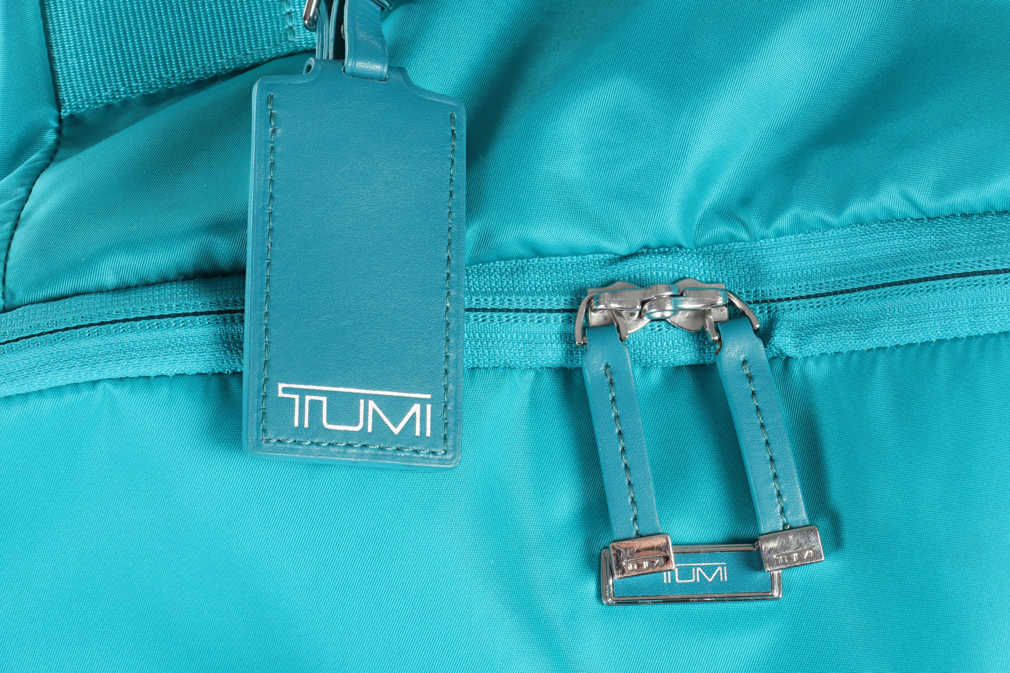 Tumi Blue Nylon Wheeled Backpack Luggage in Turquoise and Teal
