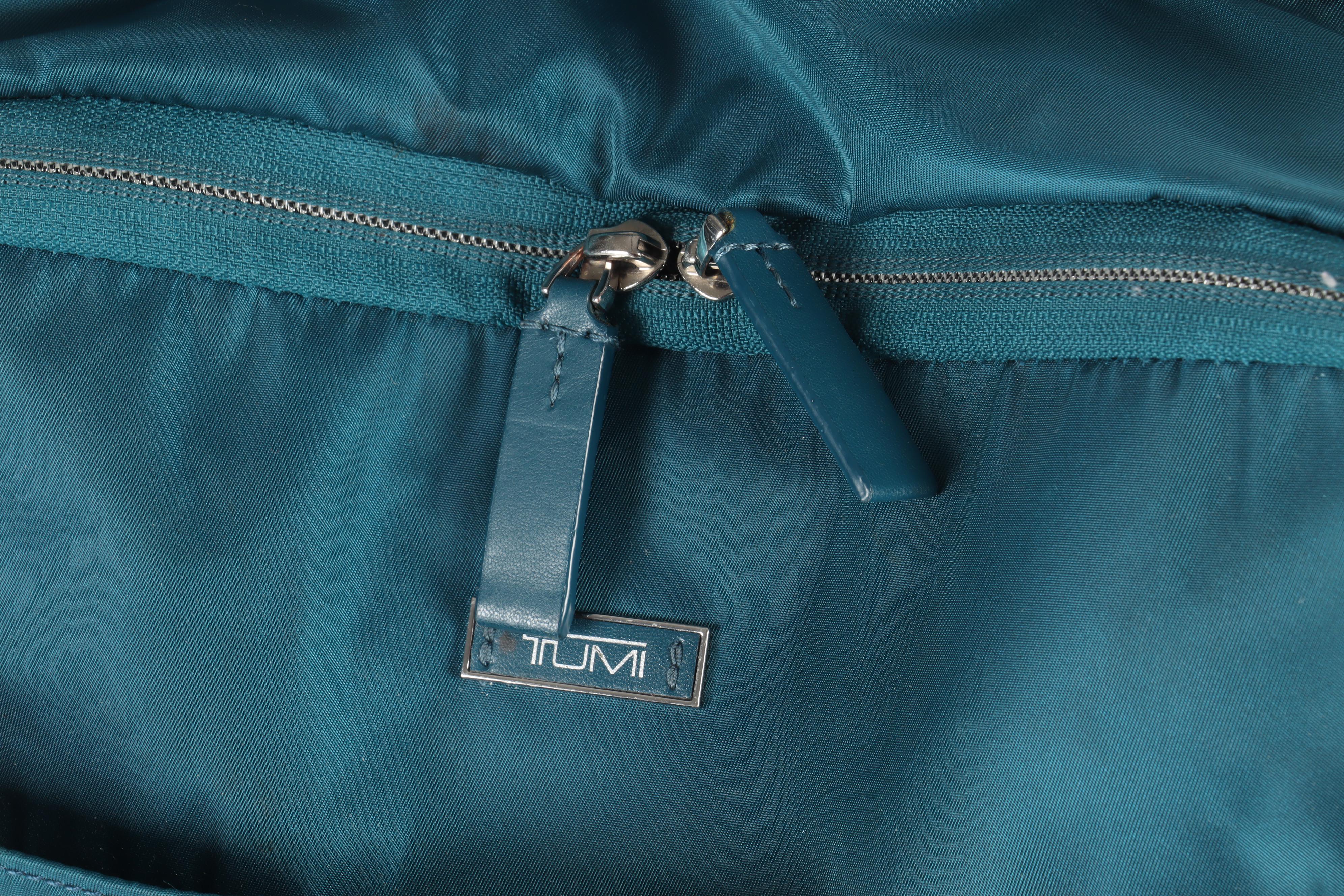 Tumi Blue Nylon Wheeled Backpack Luggage in Turquoise and Teal