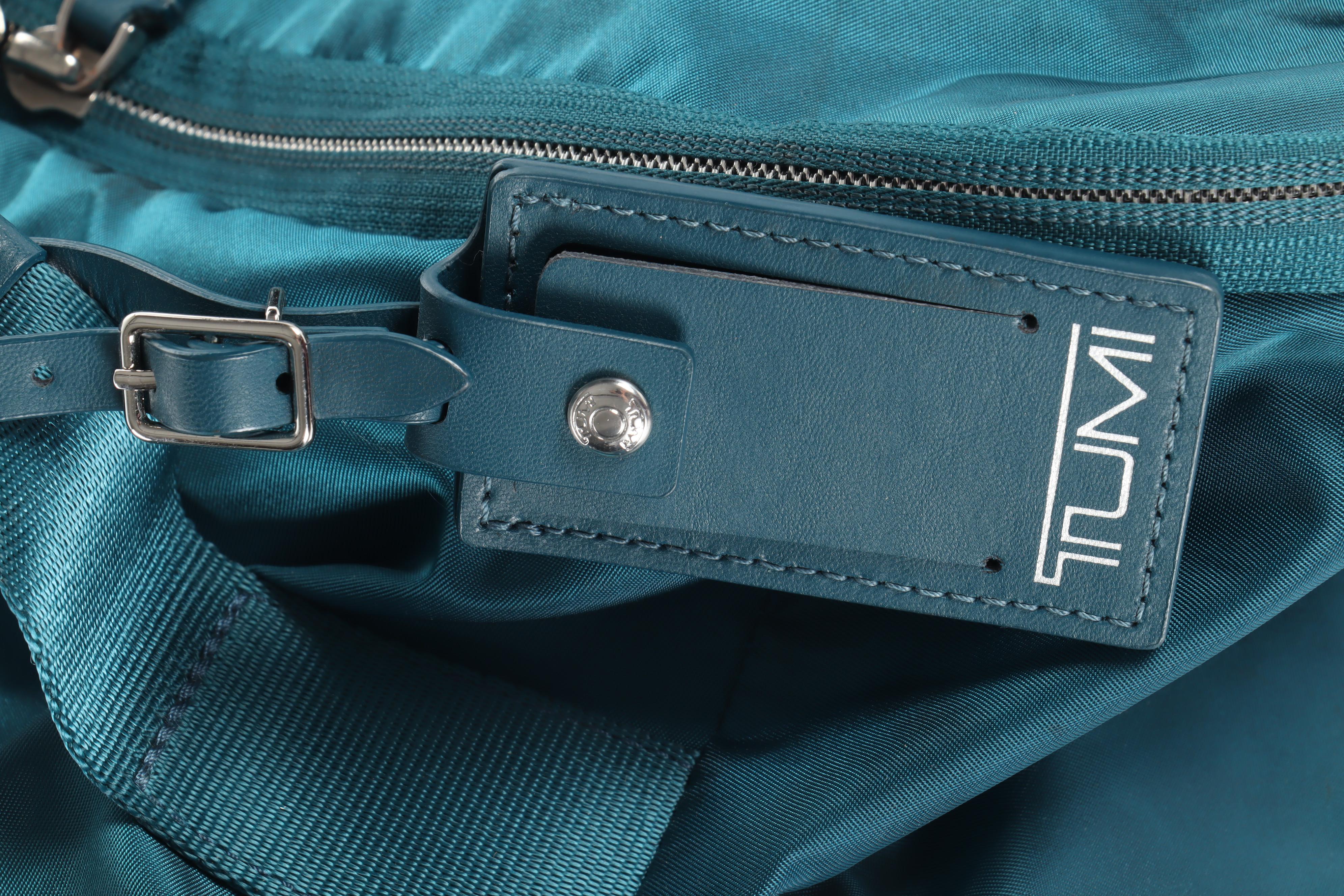 Tumi Blue Nylon Wheeled Backpack Luggage in Turquoise and Teal