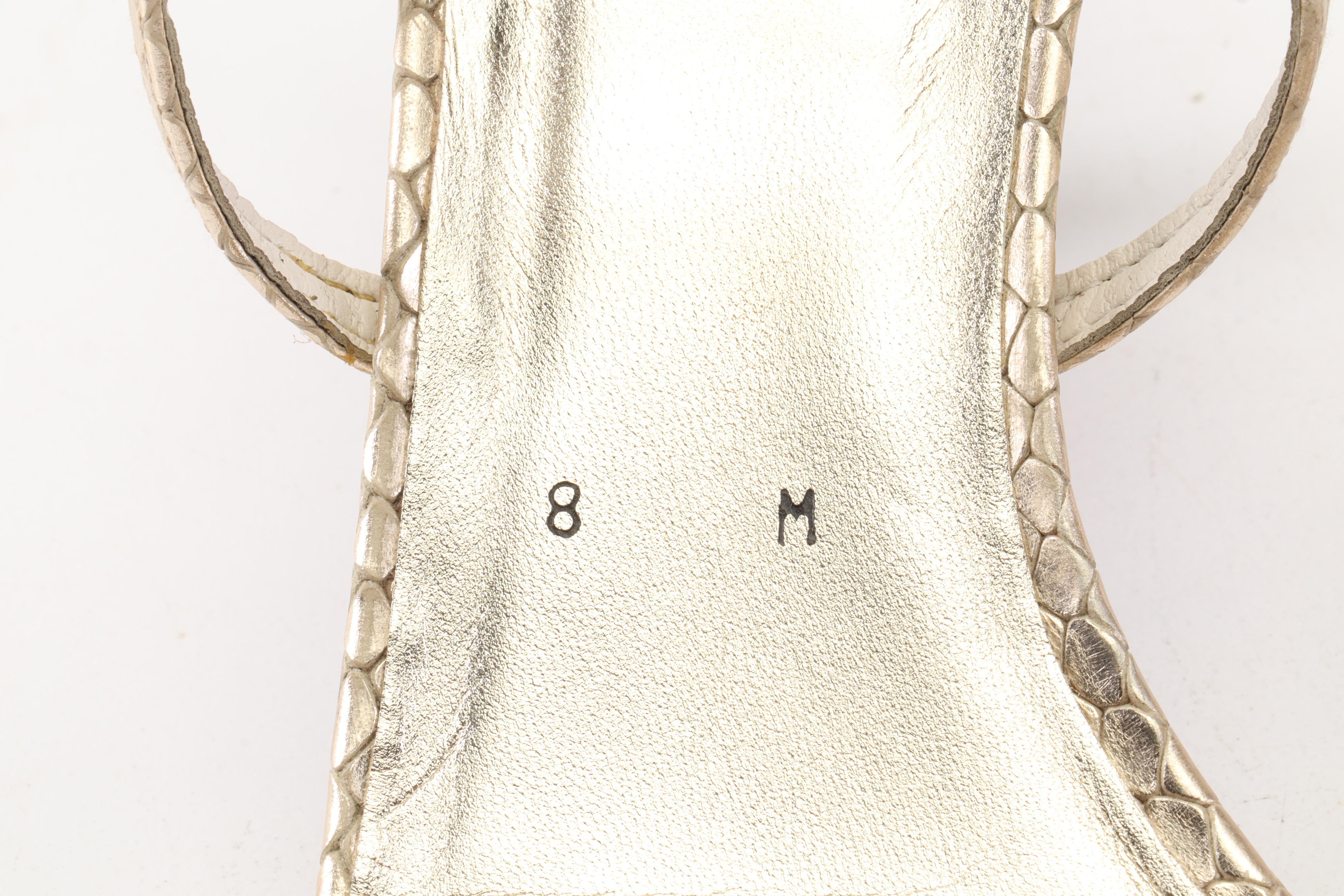 Prada Taffetas Glamour Pumps and Stuart Weitzman Snakeskin Embossed Strap Heels