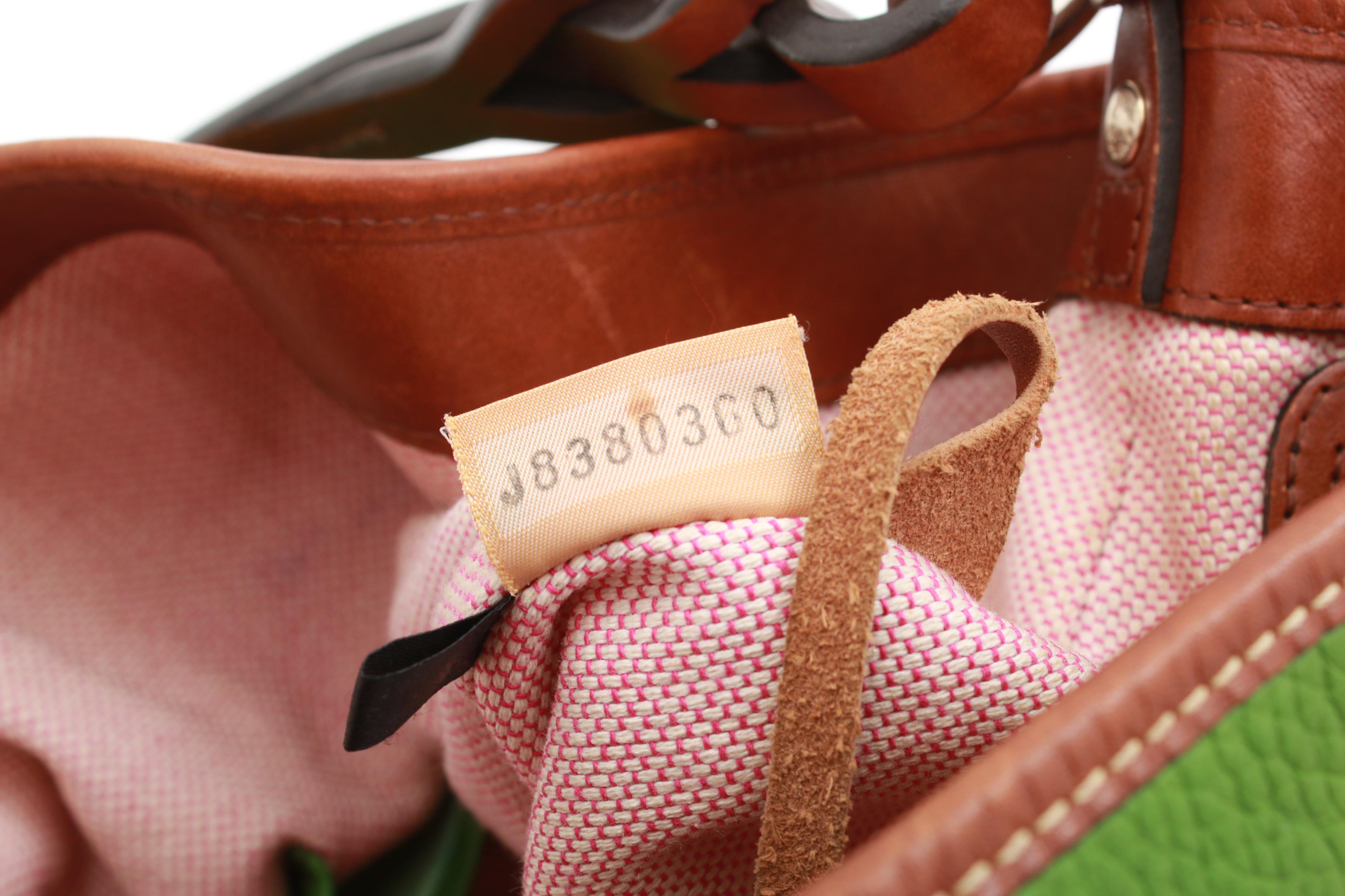 Dooney & Bourke Green Pebbled and Tan Leather Shoulder Bag