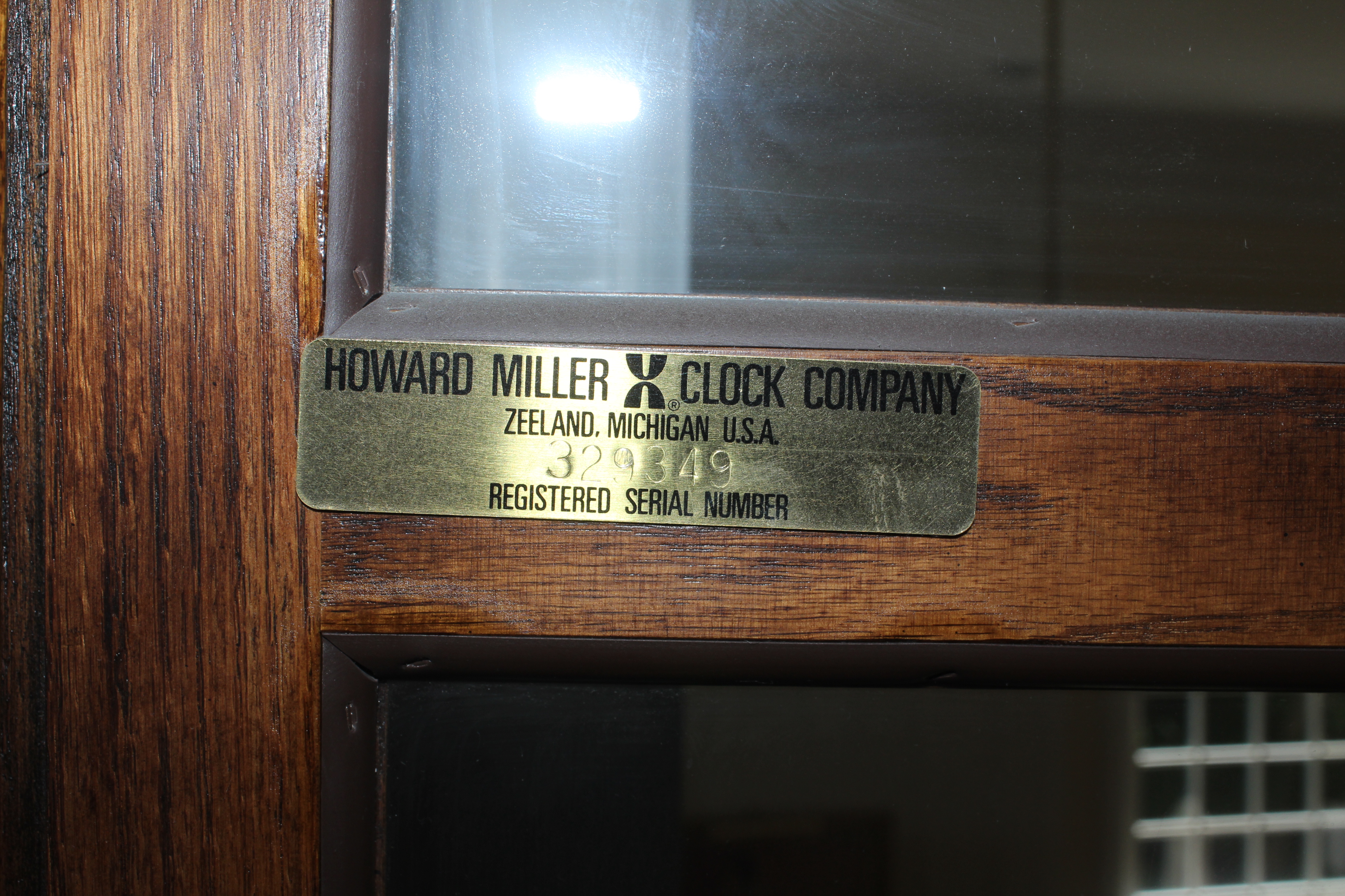 Howard Miller Oak Triple Chime Grandfather Clock