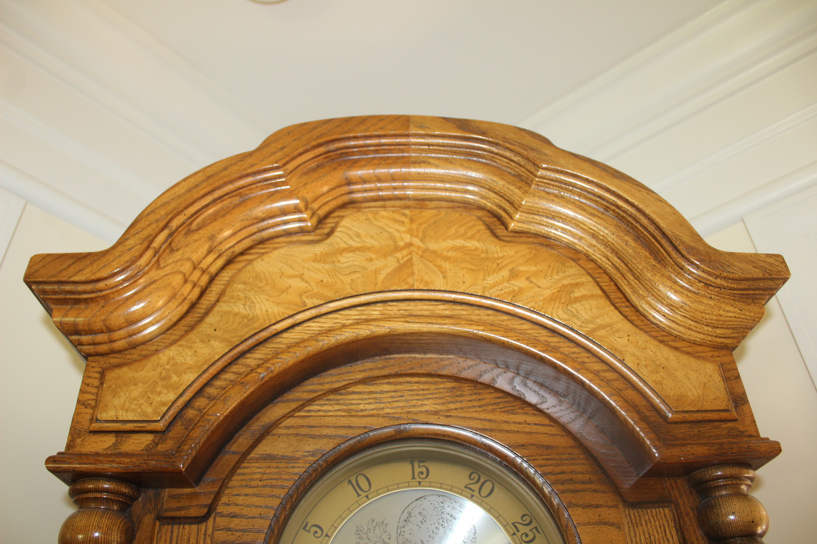 Howard Miller Oak Triple Chime Grandfather Clock