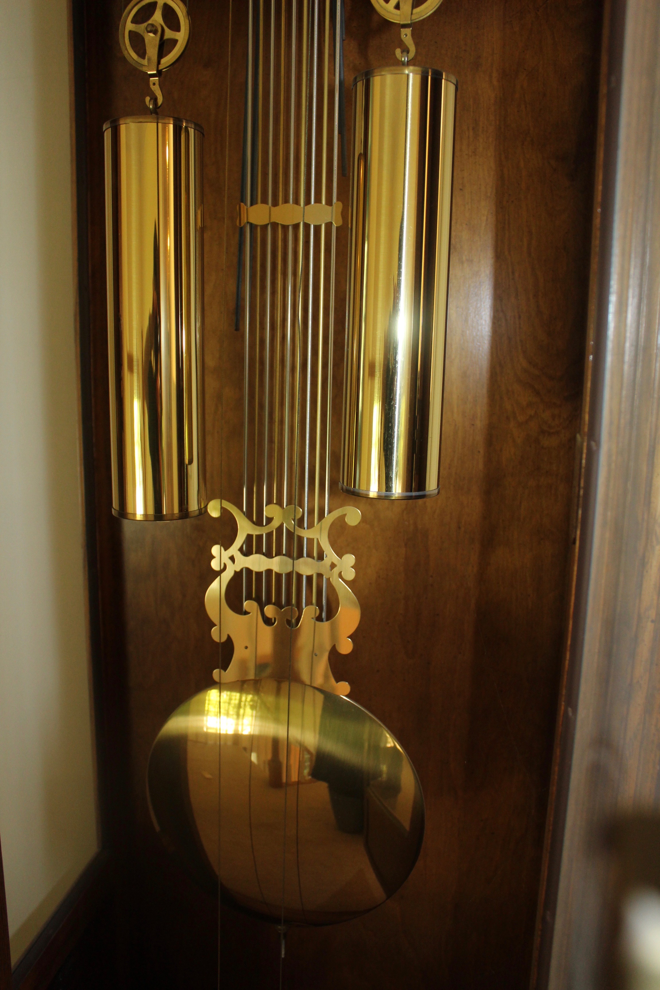 Howard Miller Oak Triple Chime Grandfather Clock