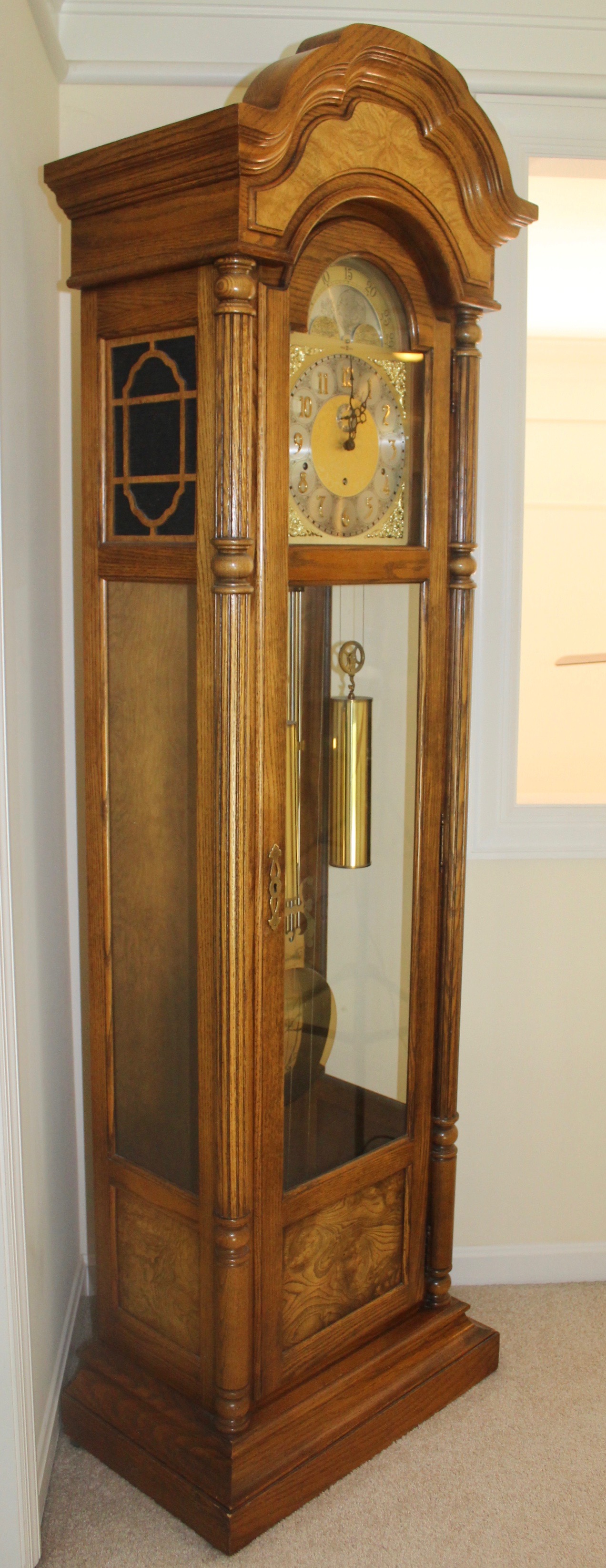 Howard Miller Oak Triple Chime Grandfather Clock