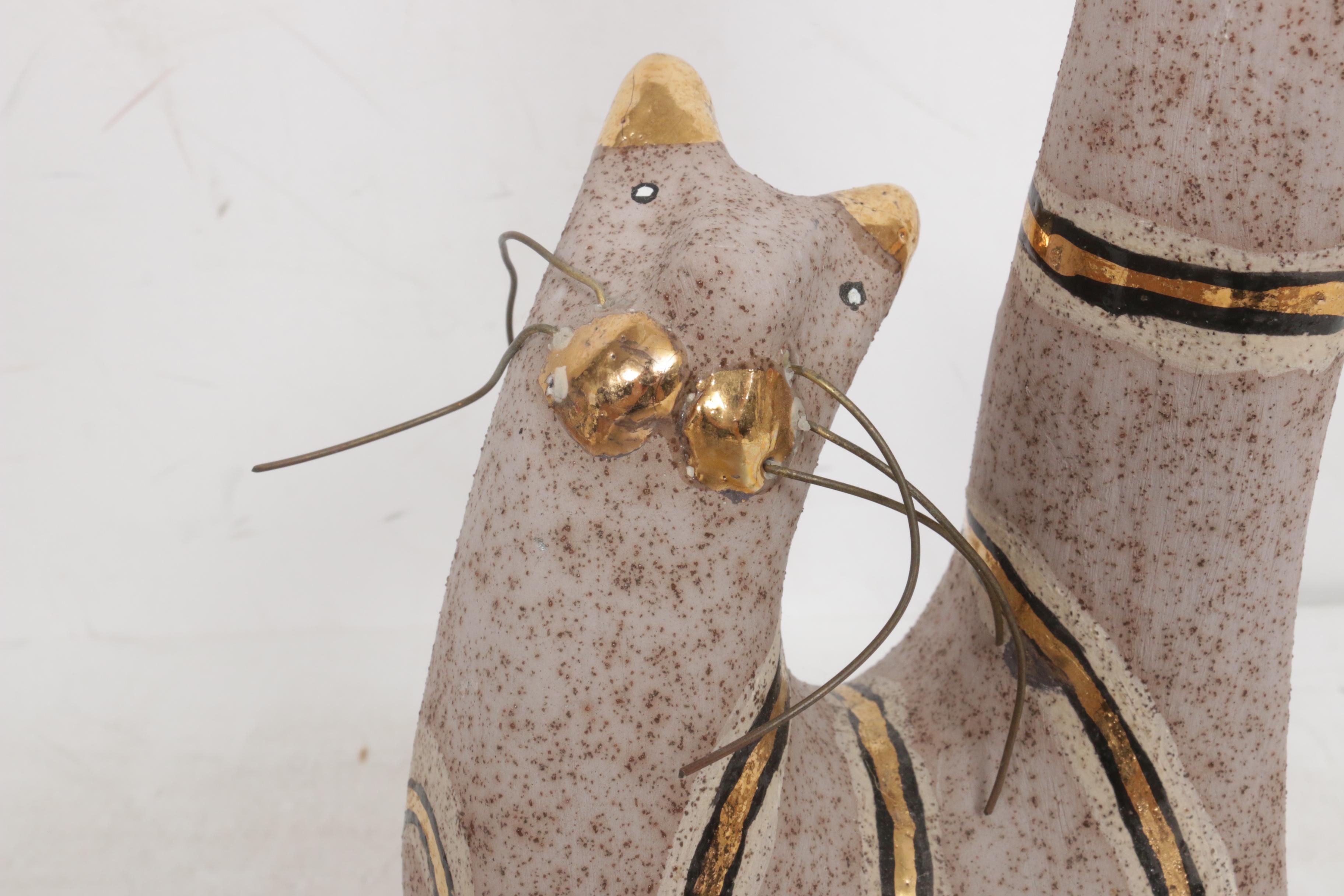 Oil Painting and Ceramic Sculpture Featuring Cats