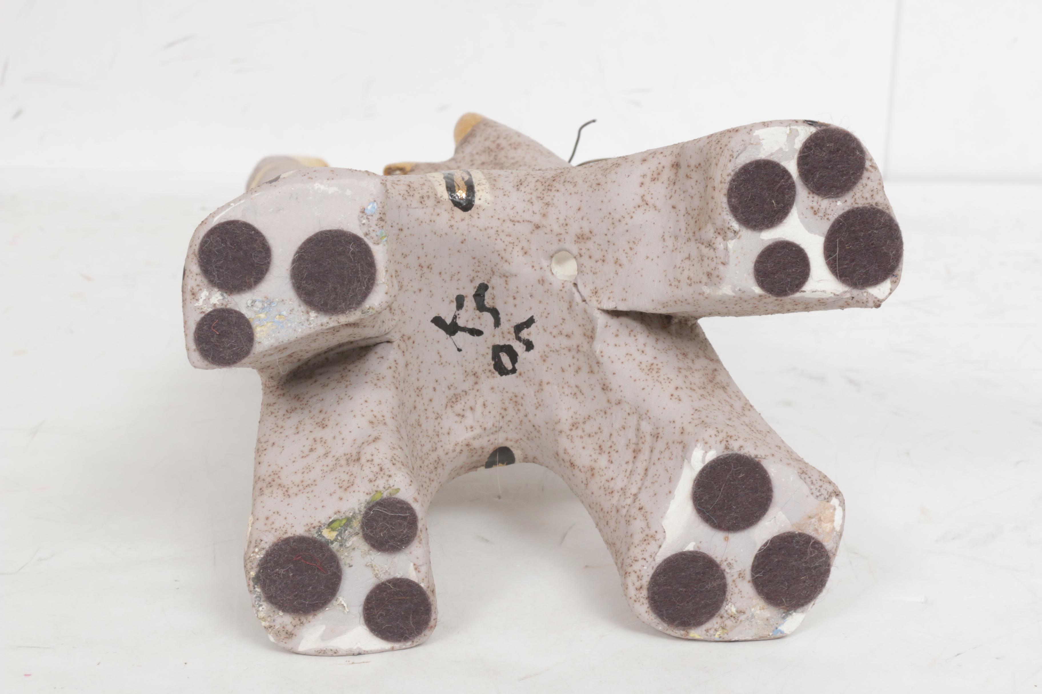 Oil Painting and Ceramic Sculpture Featuring Cats