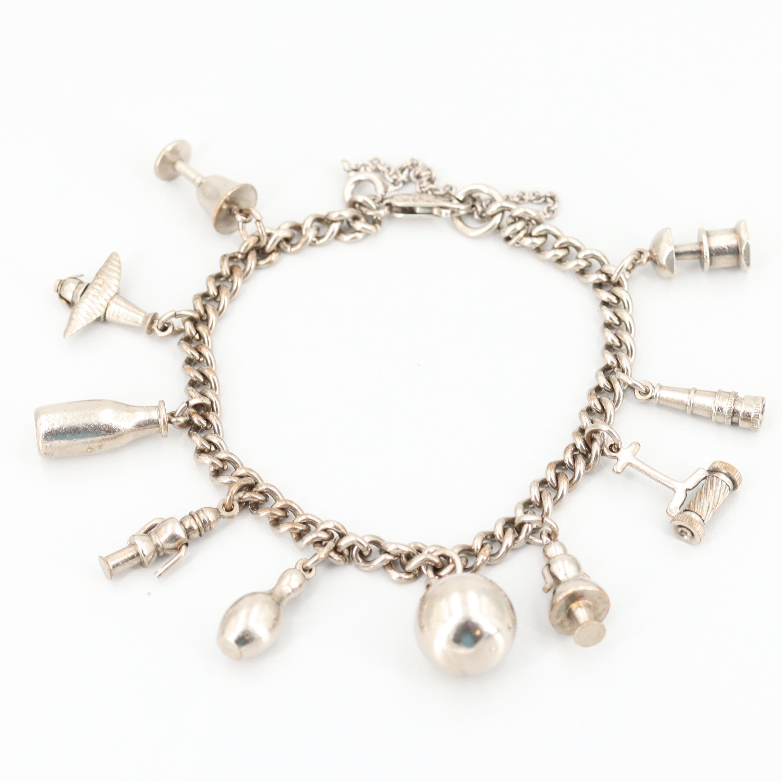 Sterling Silver Bracelet with Silver Tone Charms