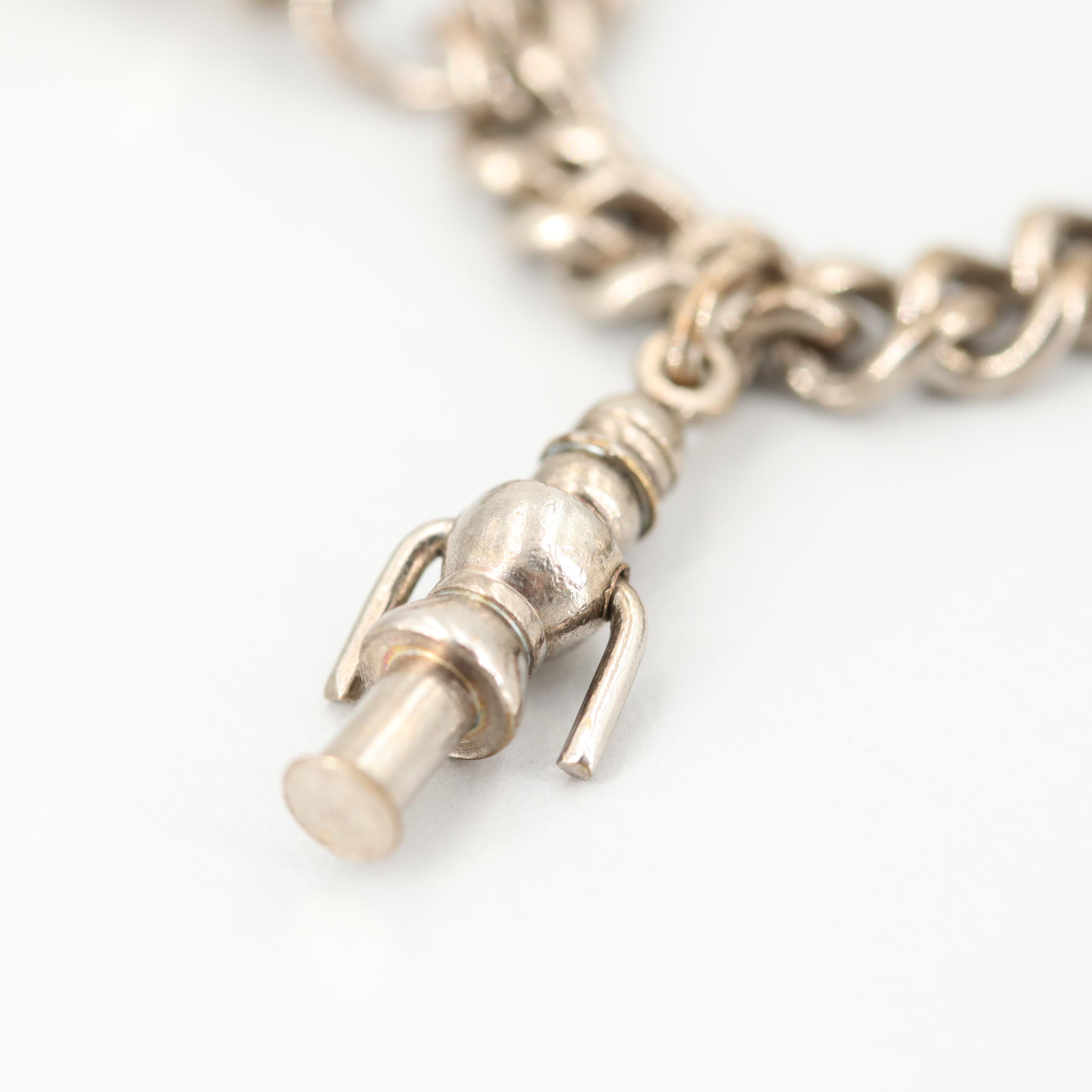 Sterling Silver Bracelet with Silver Tone Charms