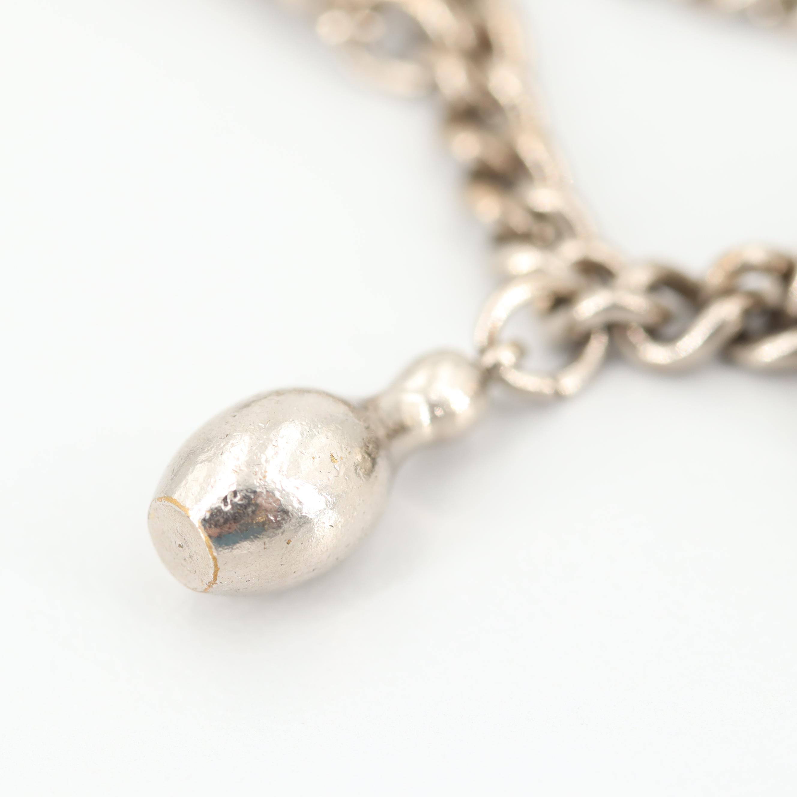 Sterling Silver Bracelet with Silver Tone Charms