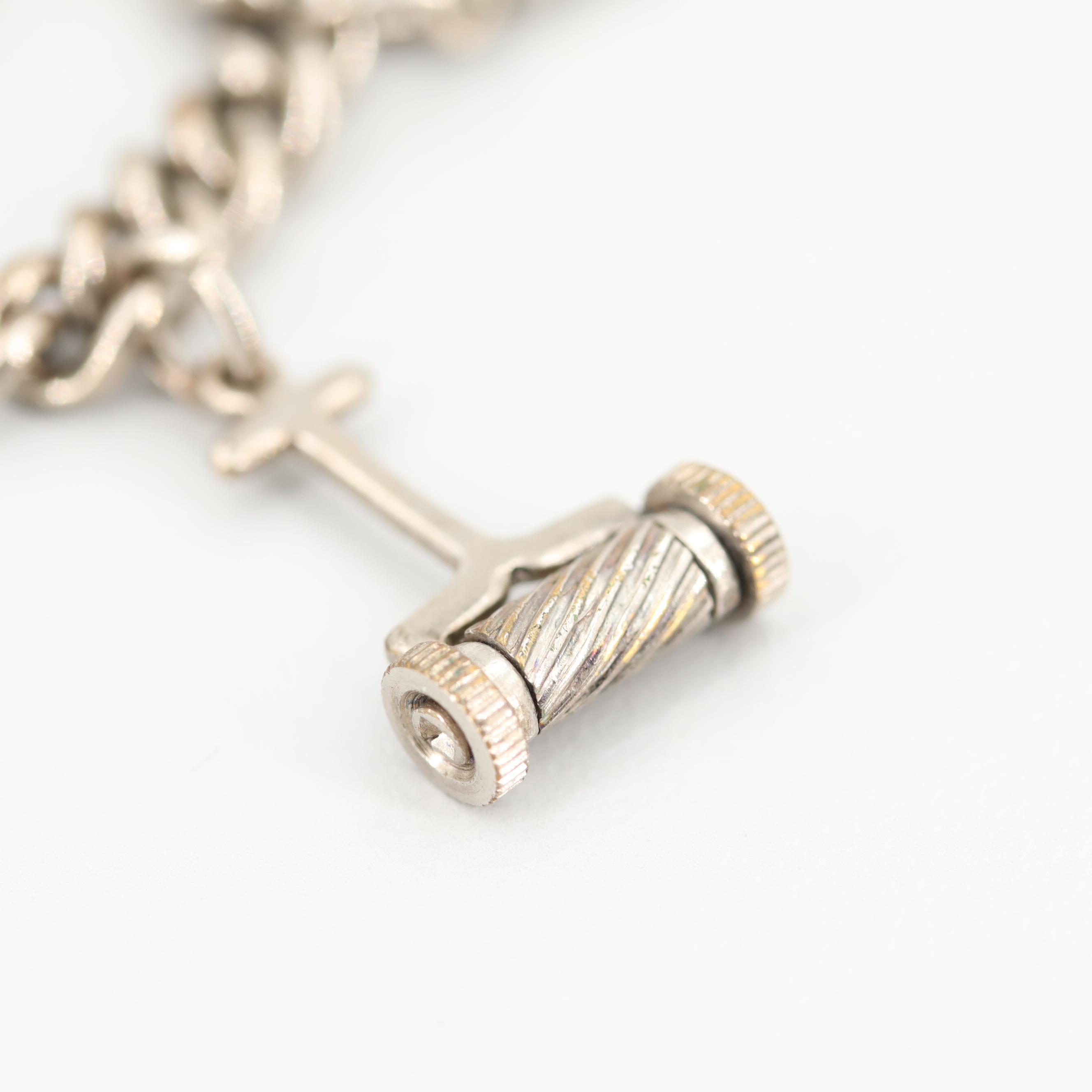 Sterling Silver Bracelet with Silver Tone Charms