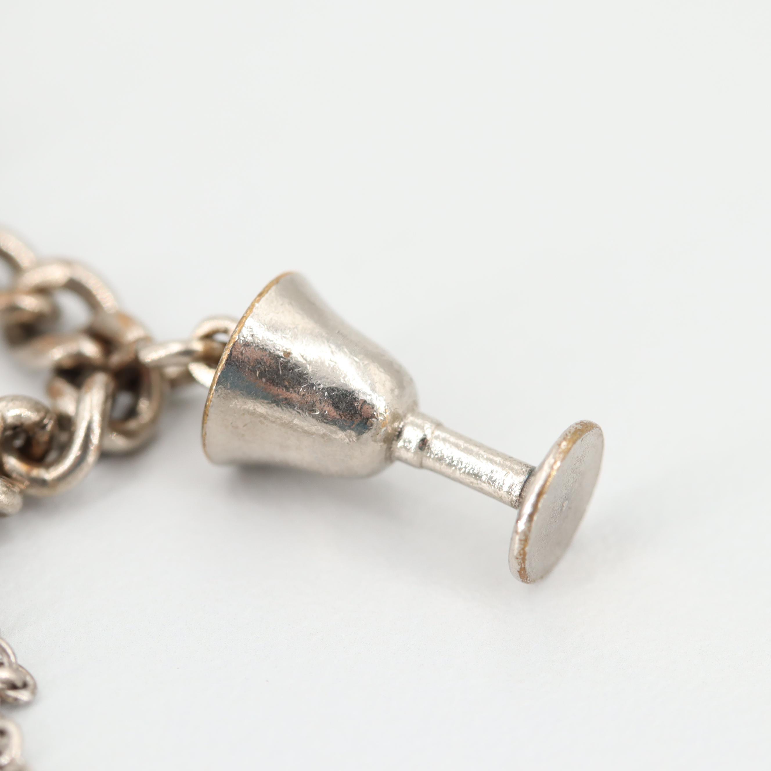 Sterling Silver Bracelet with Silver Tone Charms