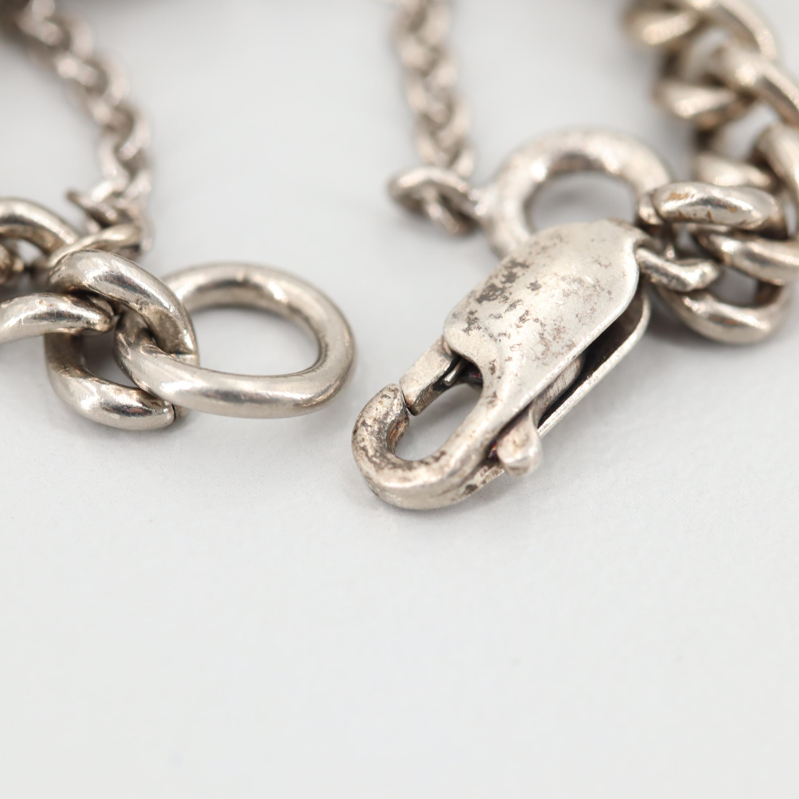 Sterling Silver Bracelet with Silver Tone Charms