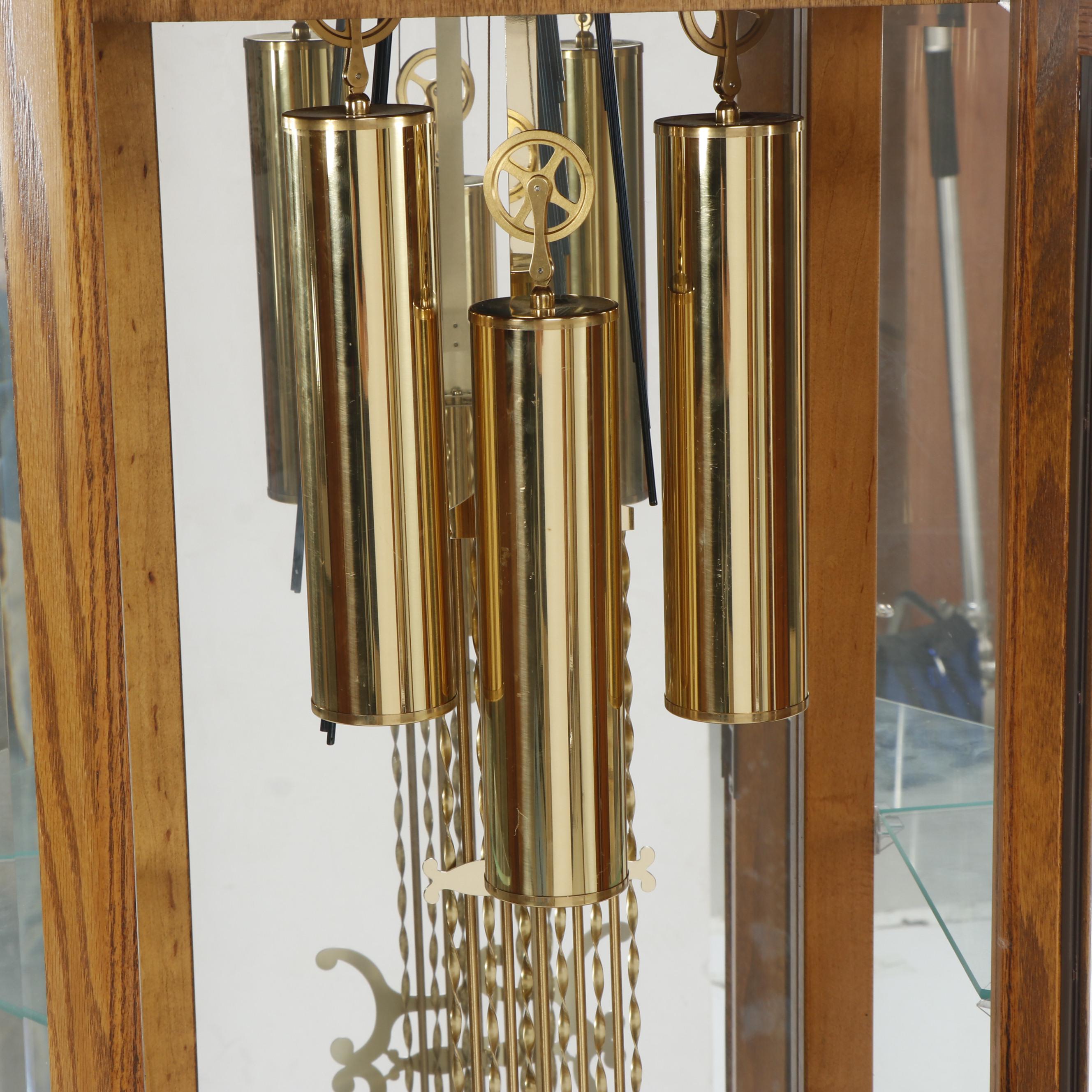 Howard Miller "Majestic" Oak Curio Cabinet Clock