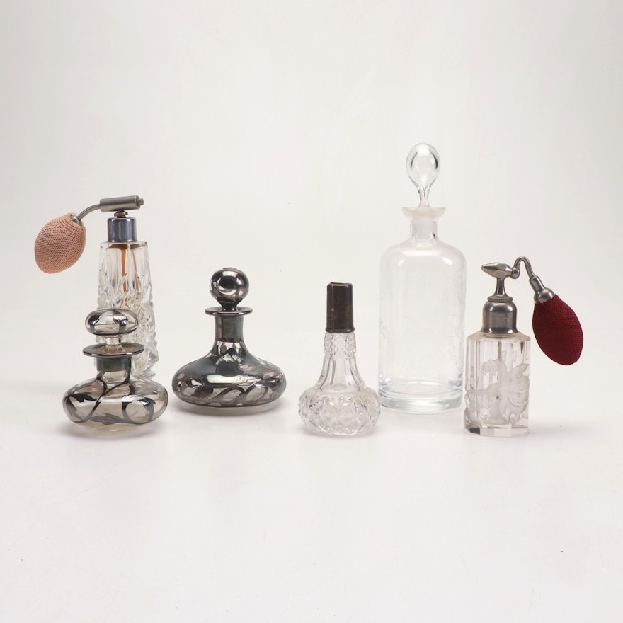 Perfume Bottles with Cut Glass, Etching, and Sterling Silver