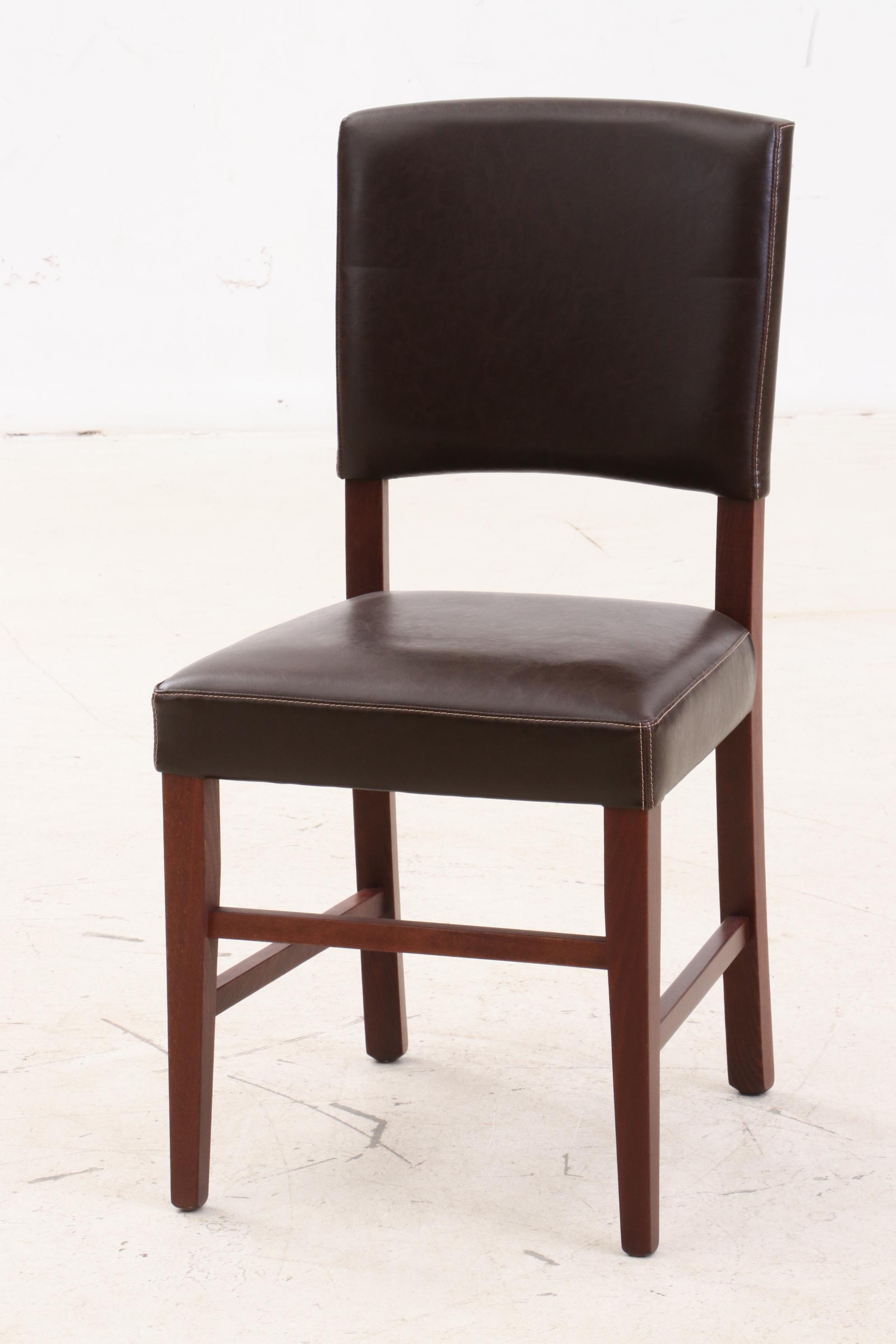 Pier 1 Leather Upholstered Chairs and Mahogany Wooden Table