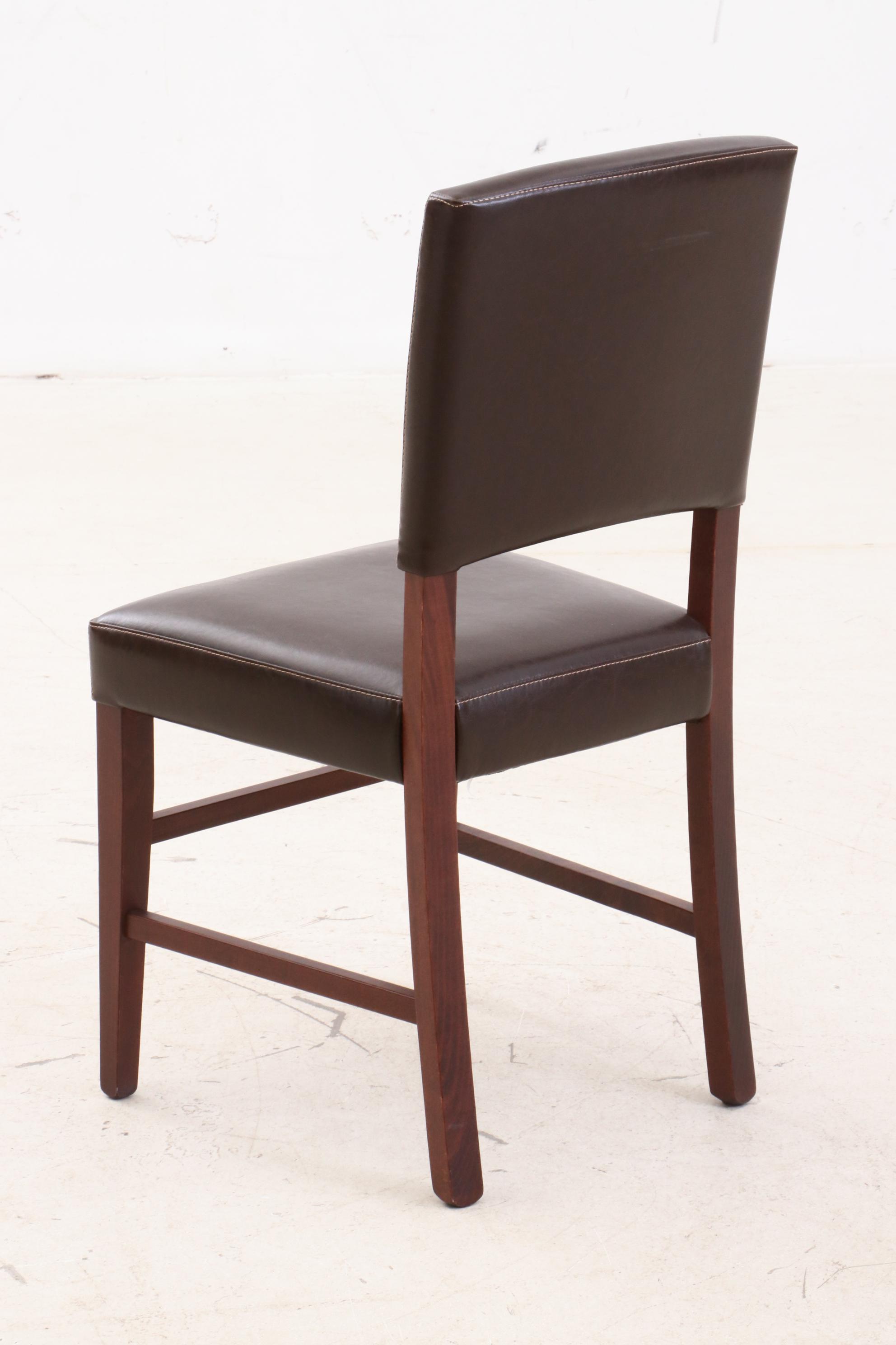 Pier 1 Leather Upholstered Chairs and Mahogany Wooden Table