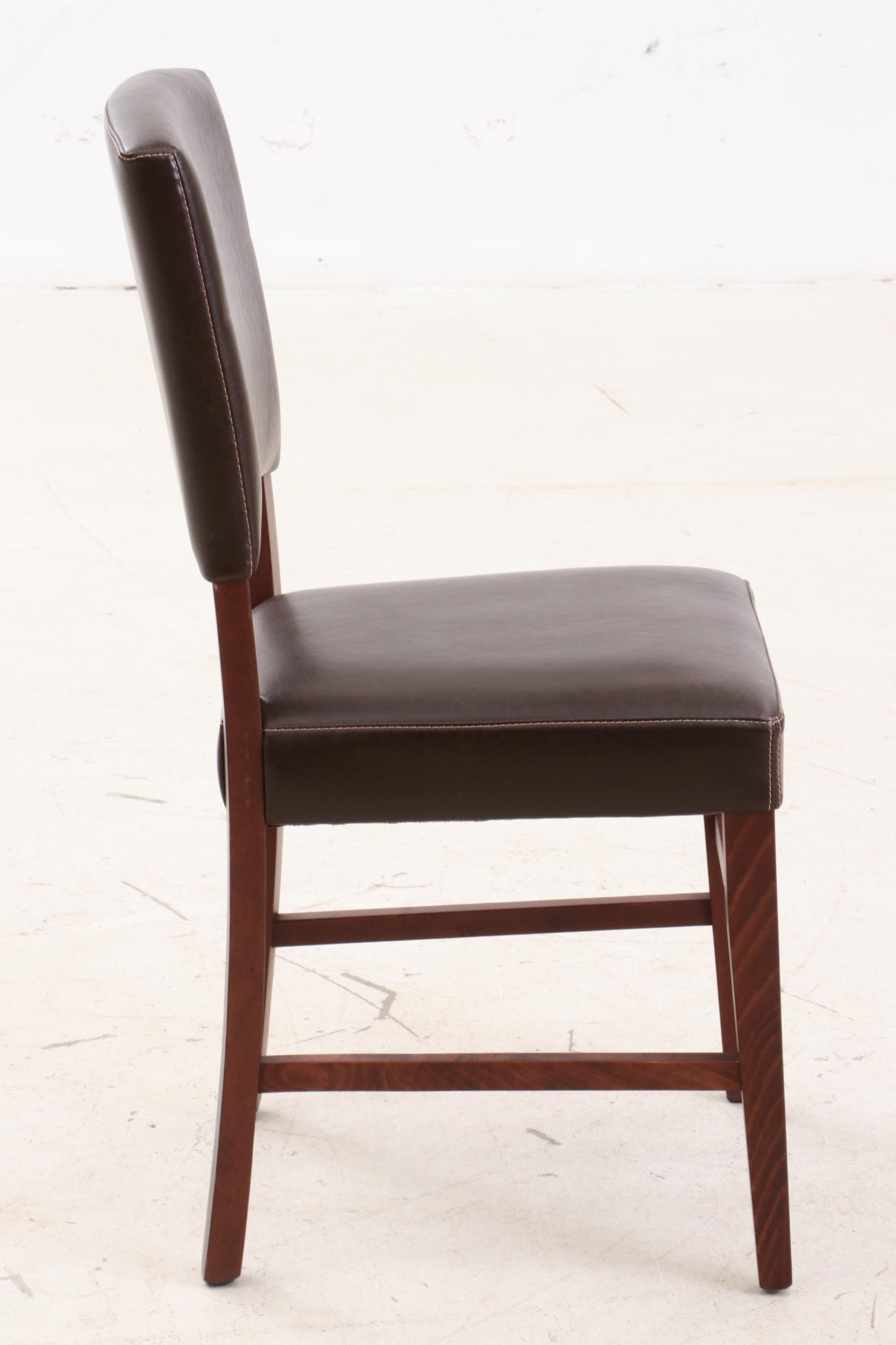 Pier 1 Leather Upholstered Chairs and Mahogany Wooden Table