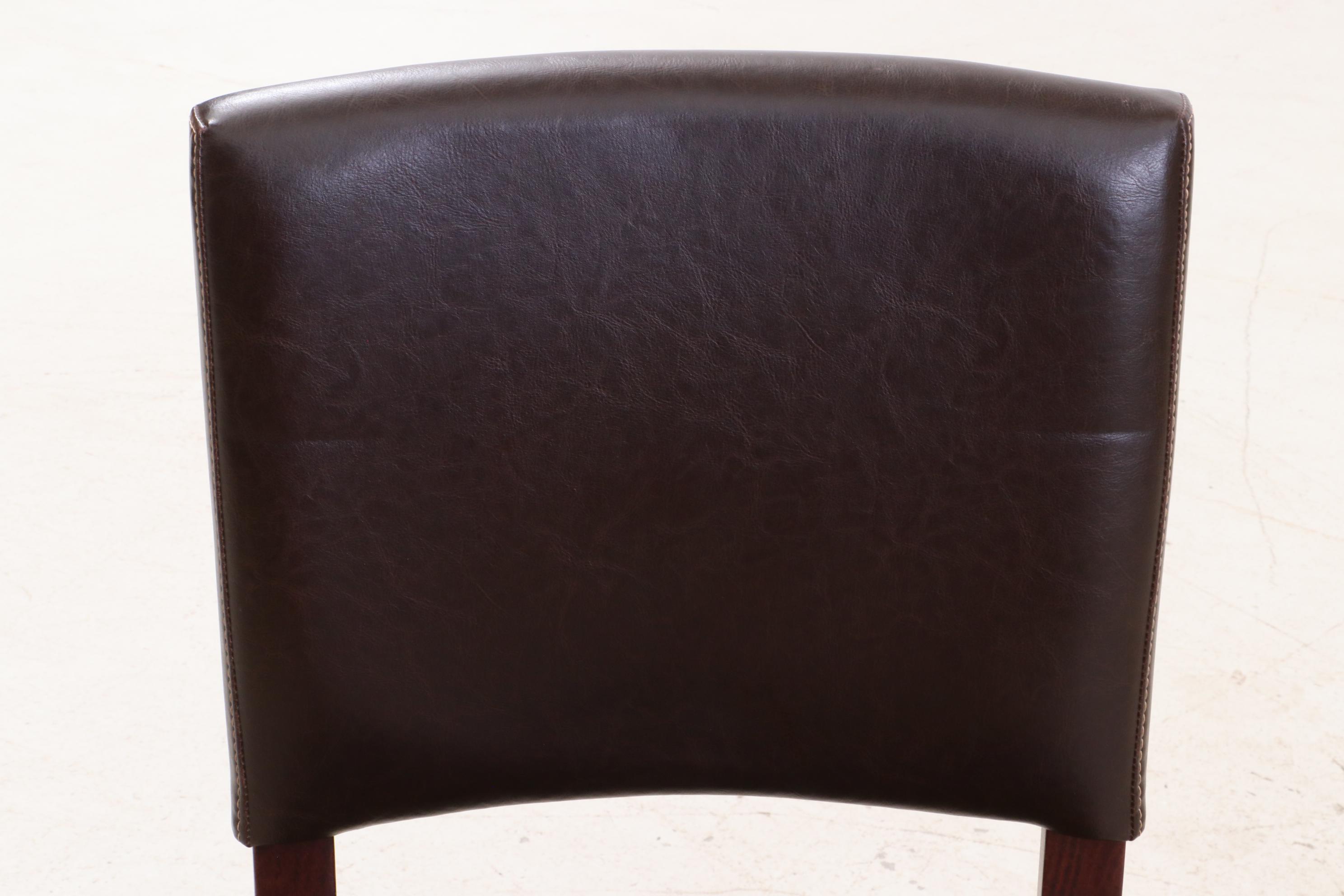 Pier 1 Leather Upholstered Chairs and Mahogany Wooden Table