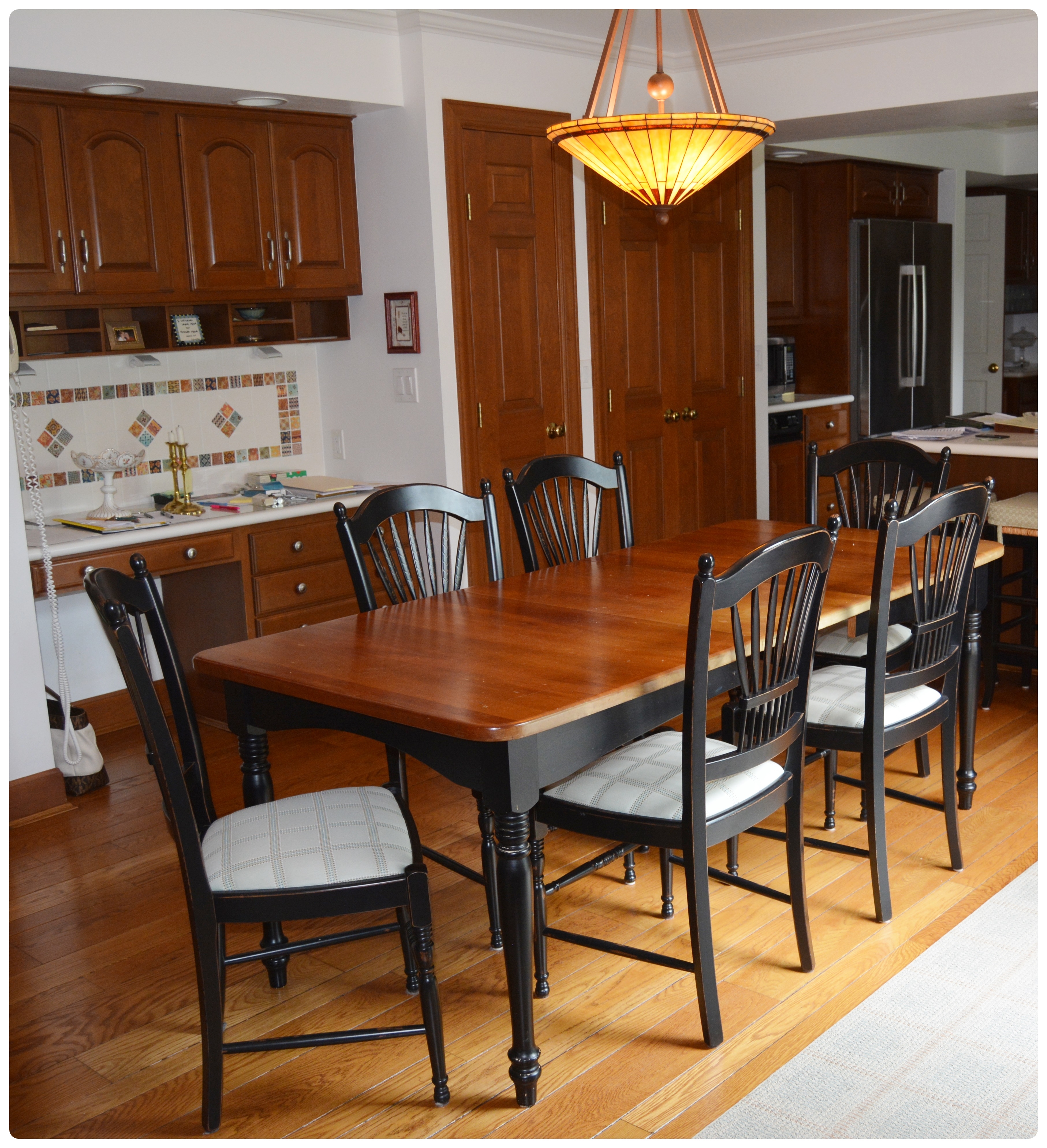 Lyndon Cherry and Black Painted Kitchen Table with Arhaus Black Dining Chairs