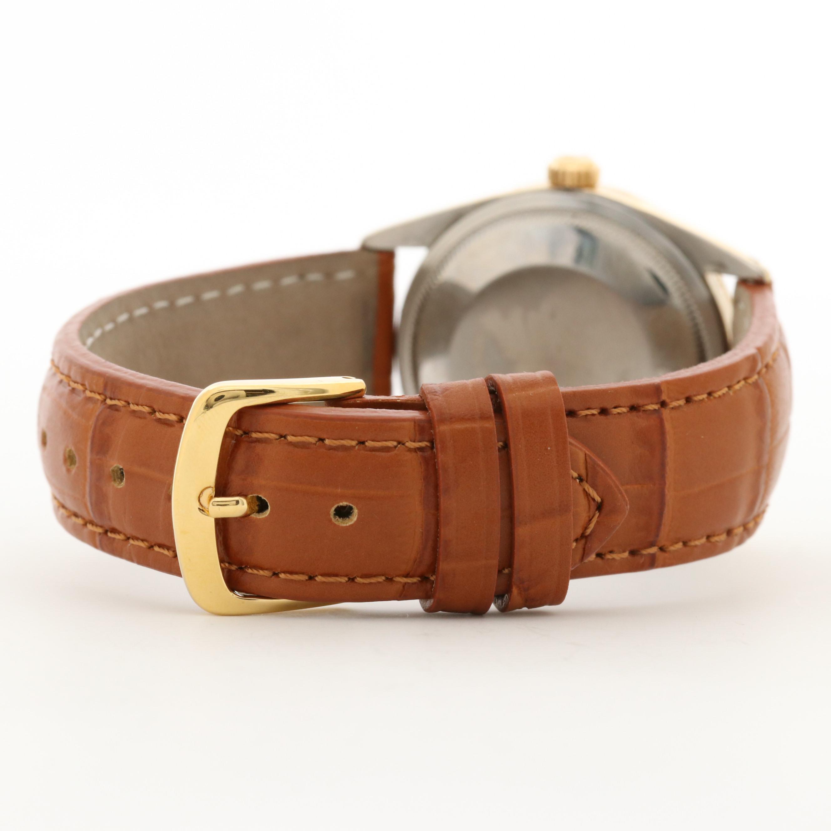 Rolex Oyster Perpetual Date Gold Shell Watch