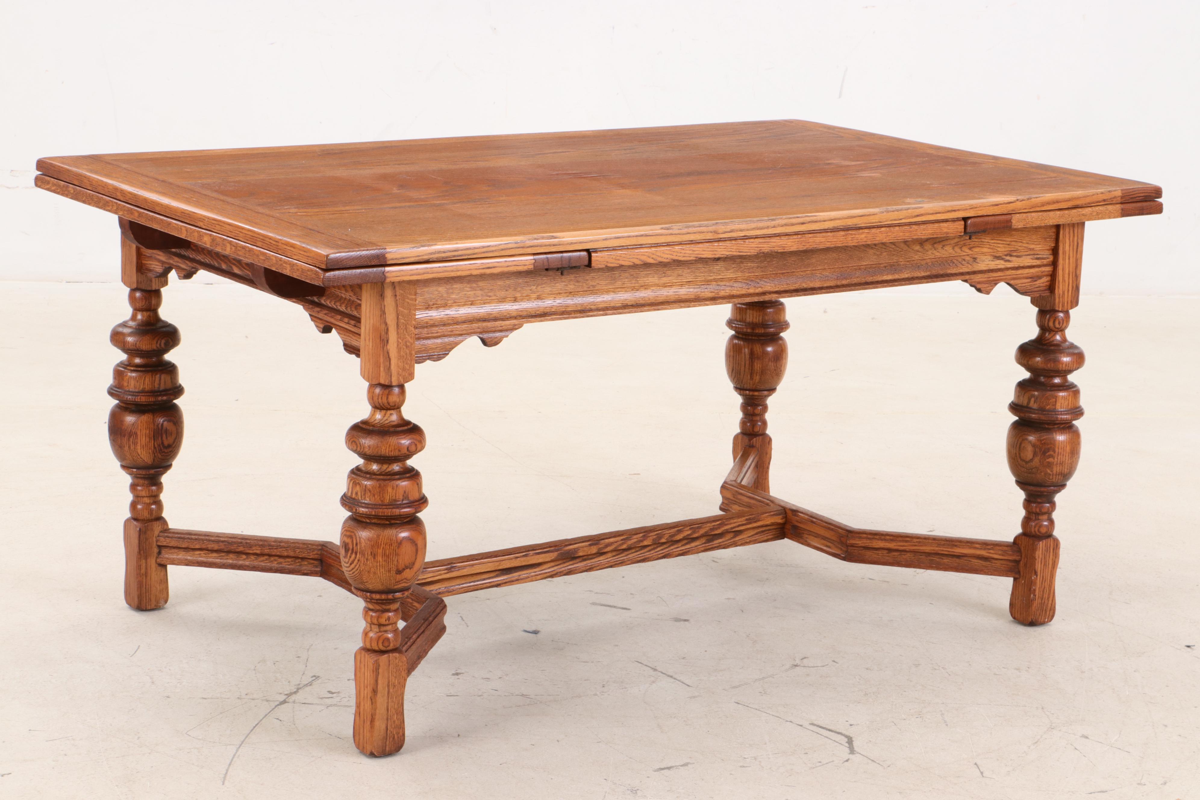 Jacobean Style Oak Dining Table and Six Chairs, Circa 1920s