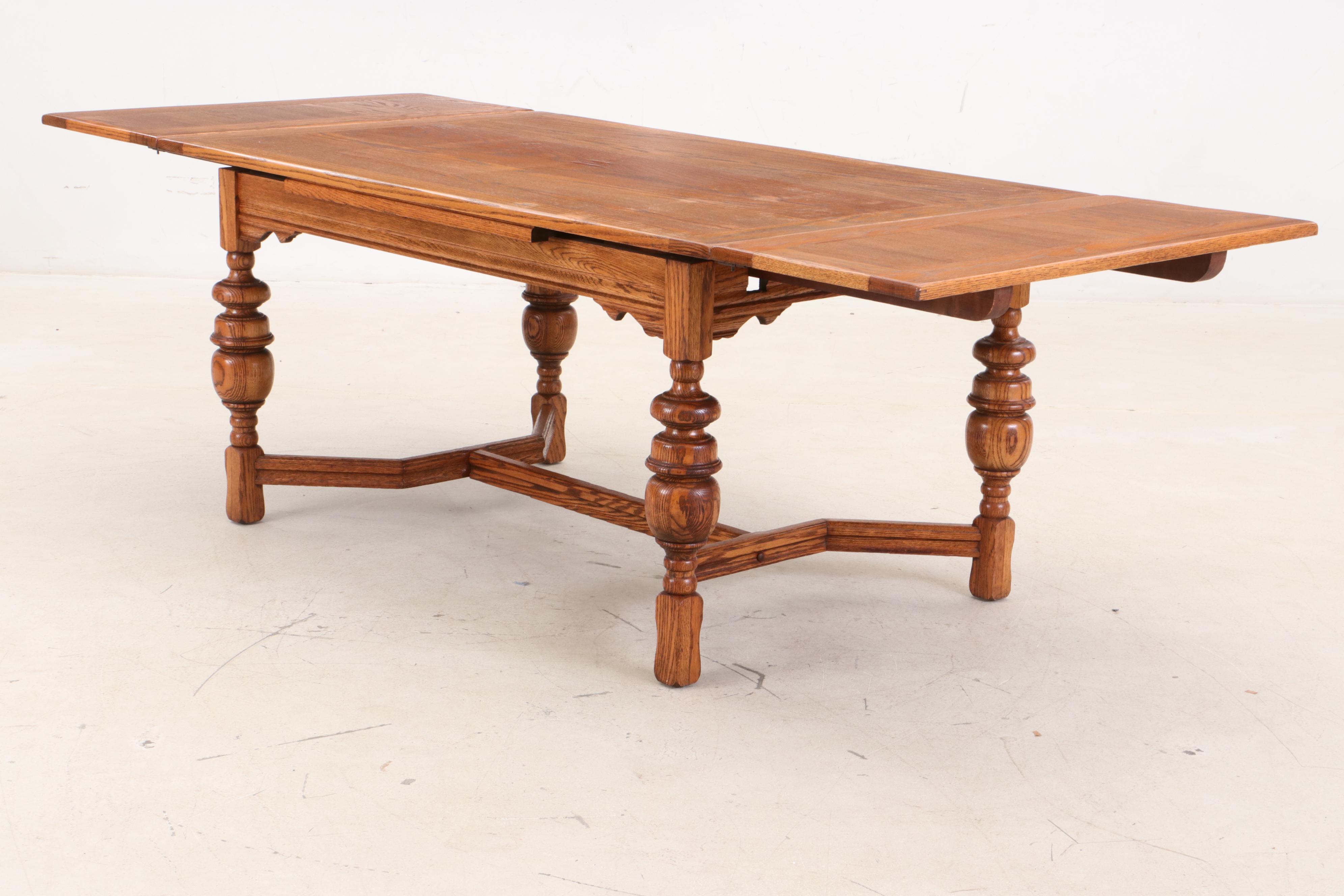 Jacobean Style Oak Dining Table and Six Chairs, Circa 1920s