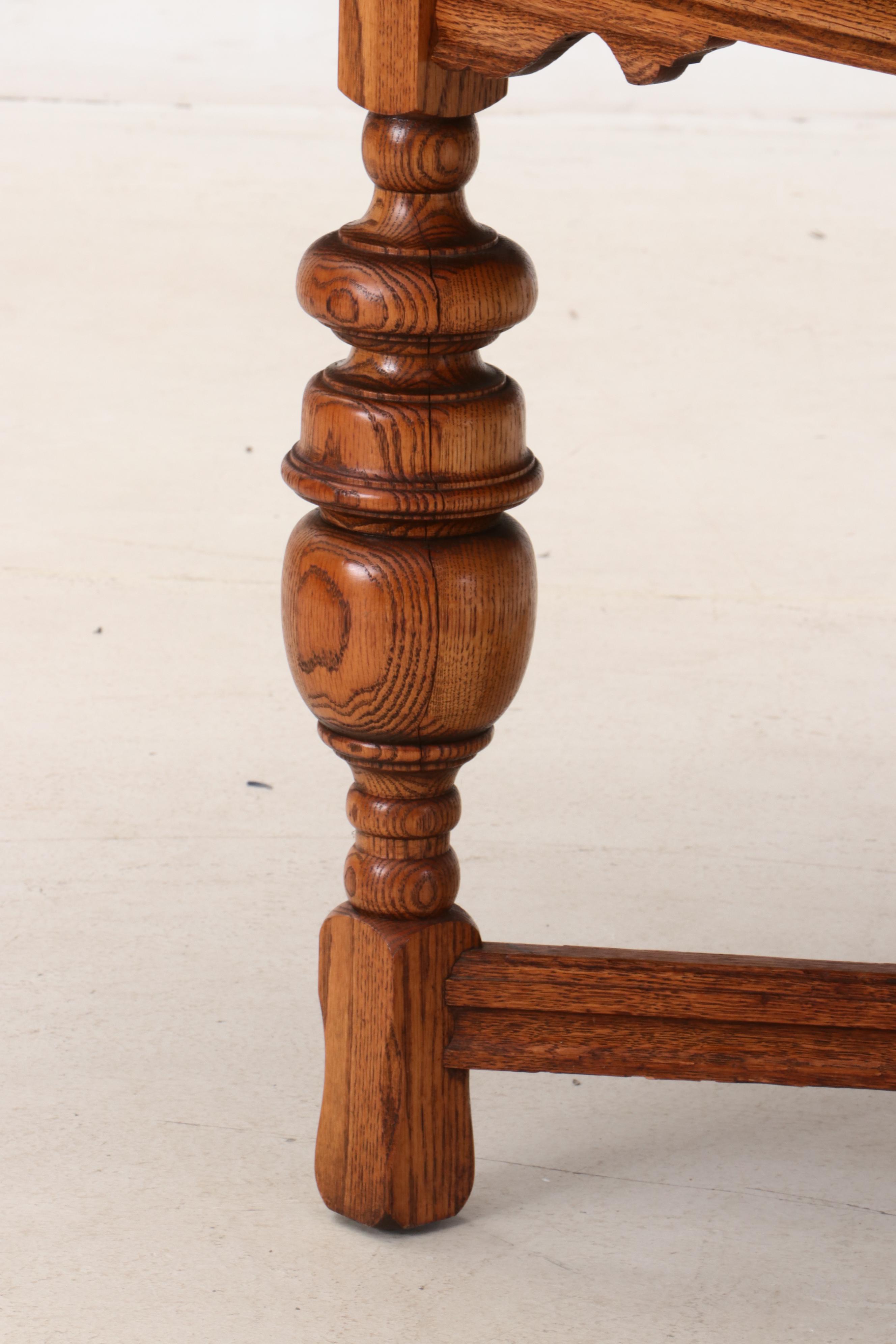 Jacobean Style Oak Dining Table and Six Chairs, Circa 1920s