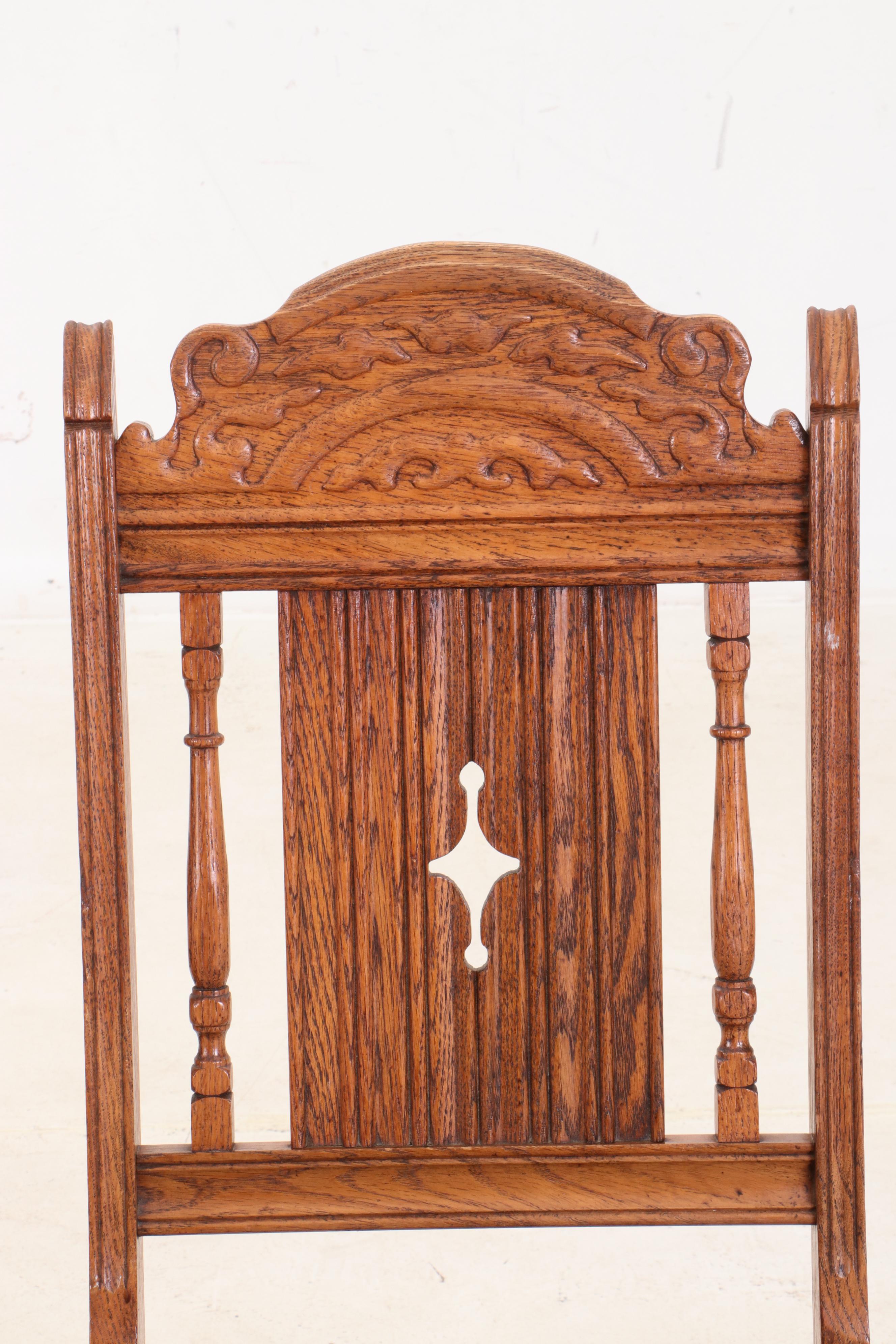 Jacobean Style Oak Dining Table and Six Chairs, Circa 1920s