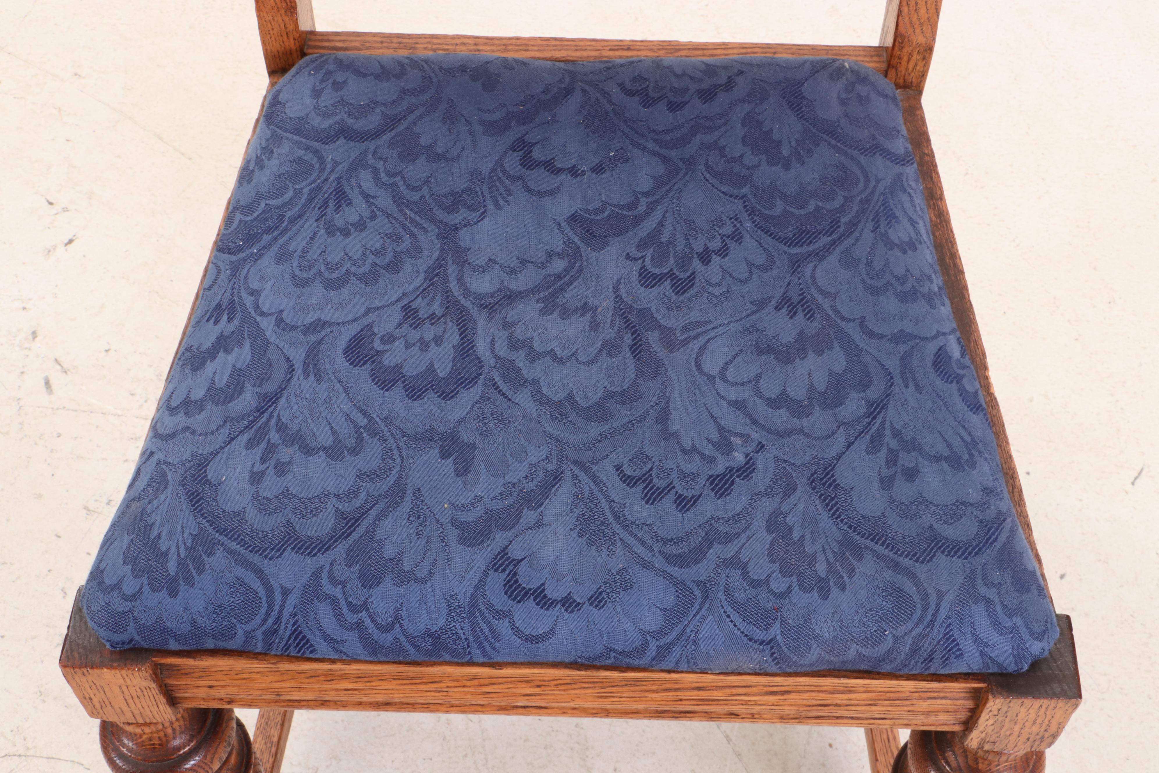 Jacobean Style Oak Dining Table and Six Chairs, Circa 1920s