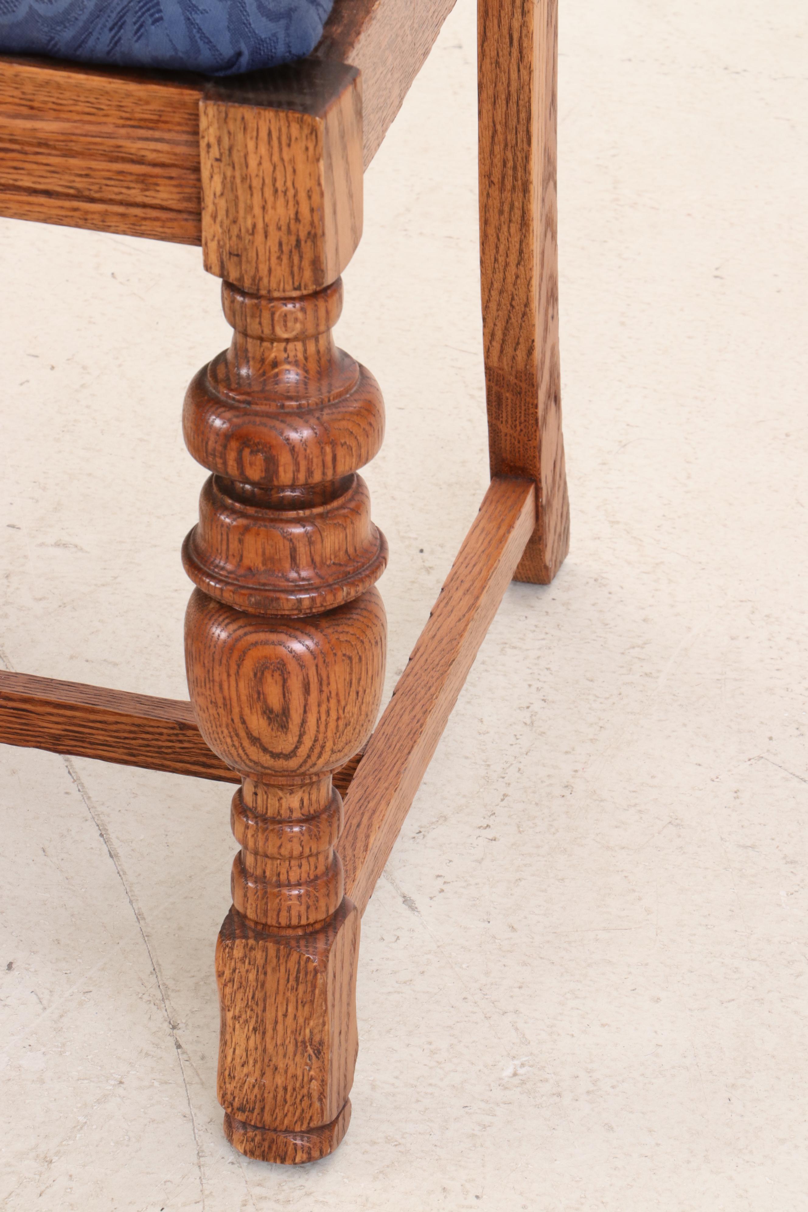 Jacobean Style Oak Dining Table and Six Chairs, Circa 1920s