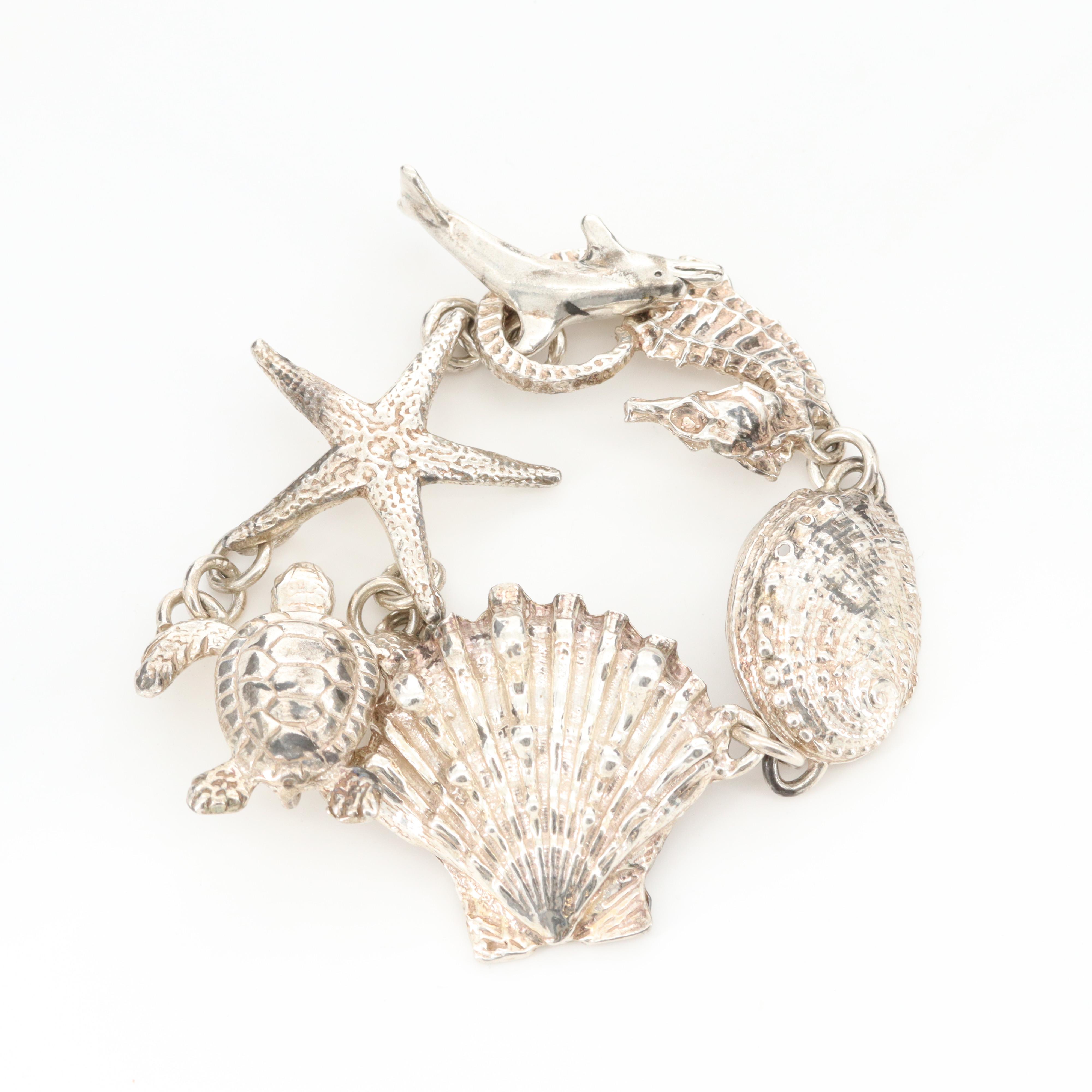 Signed Sterling Ocean Themed Bracelet Including Dolphin, Turtle and Starfish