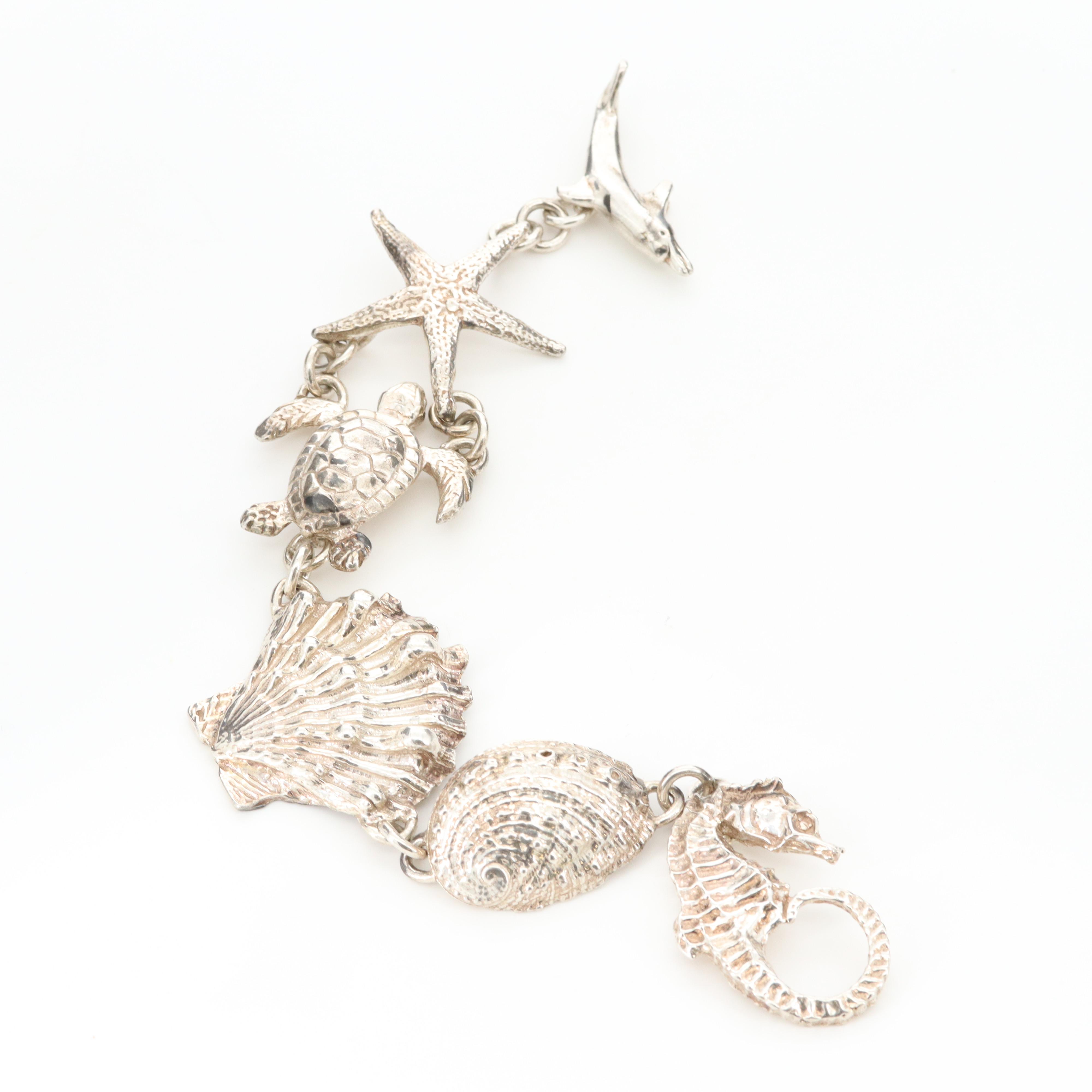 Signed Sterling Ocean Themed Bracelet Including Dolphin, Turtle and Starfish