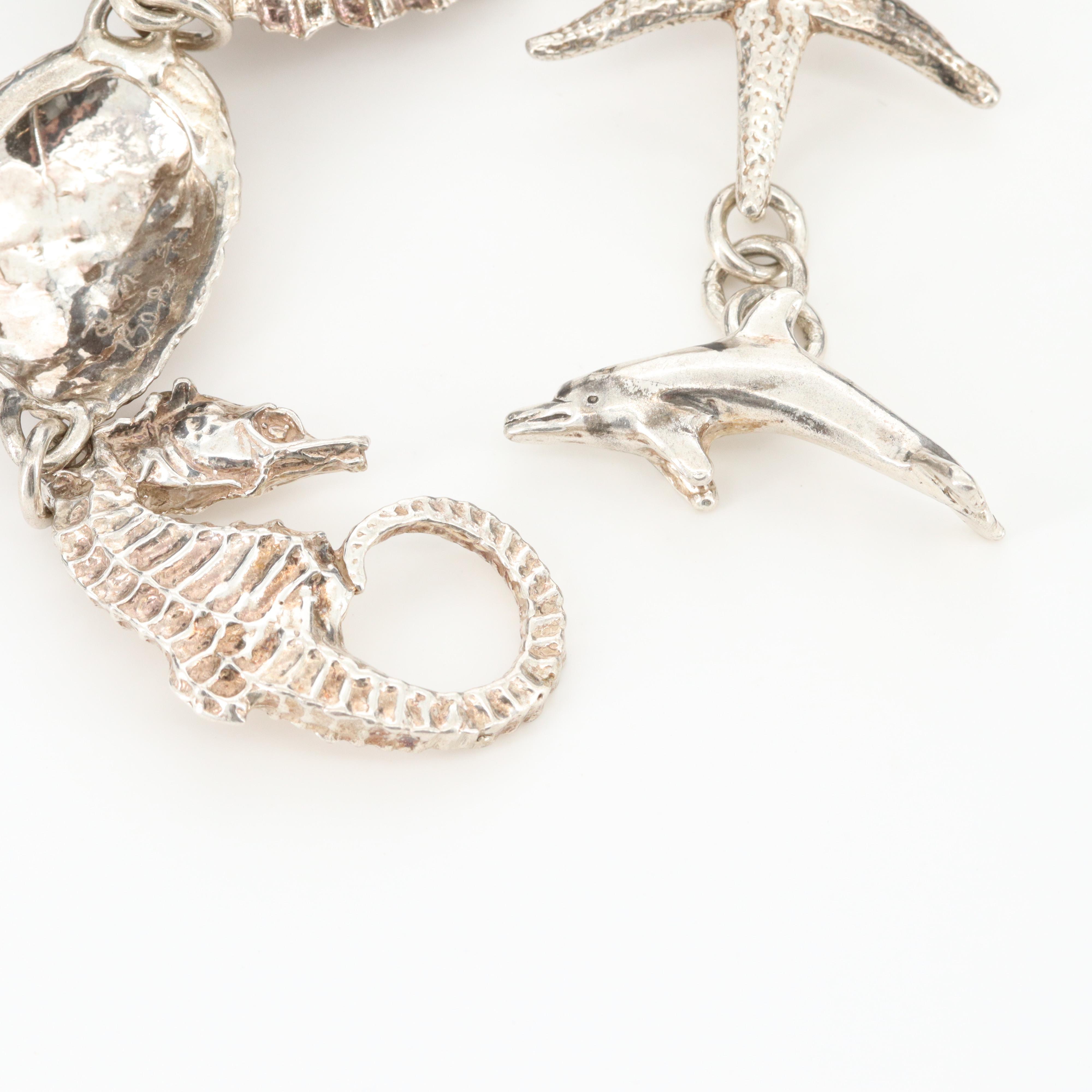 Signed Sterling Ocean Themed Bracelet Including Dolphin, Turtle and Starfish
