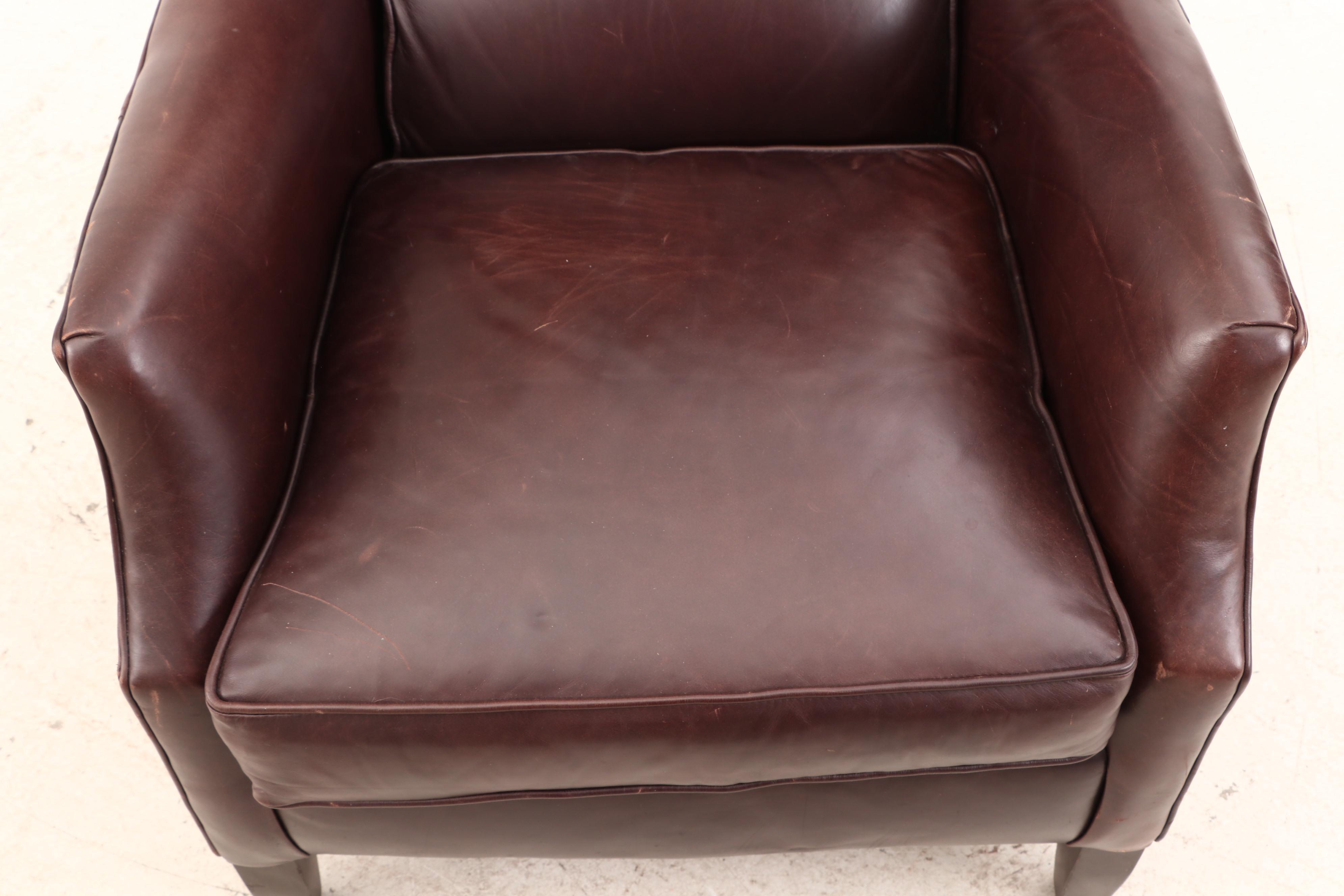 Arhaus Furniture, "Alex" Brown Leather Armchair and Ottoman