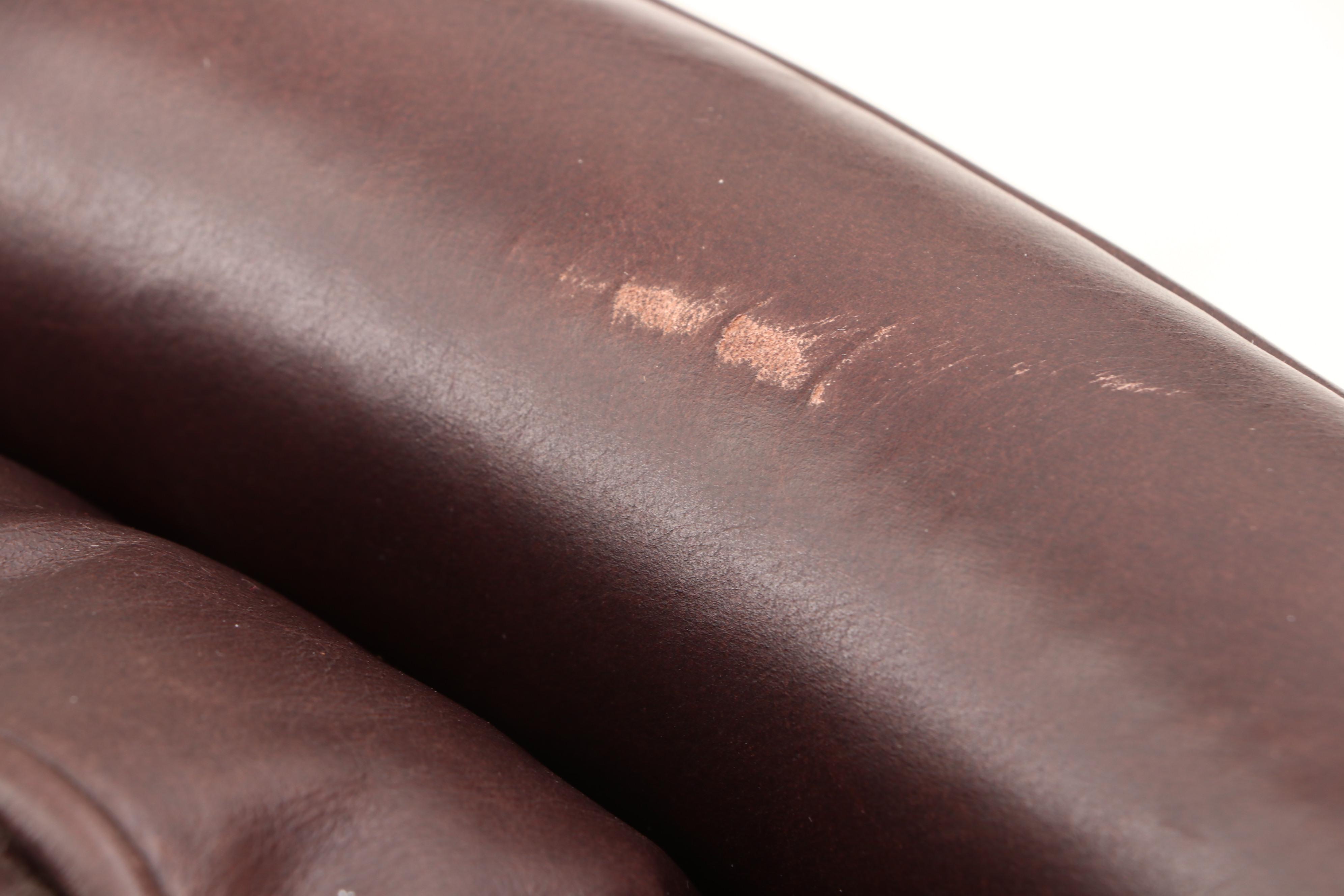 Arhaus Furniture, "Alex" Brown Leather Armchair and Ottoman