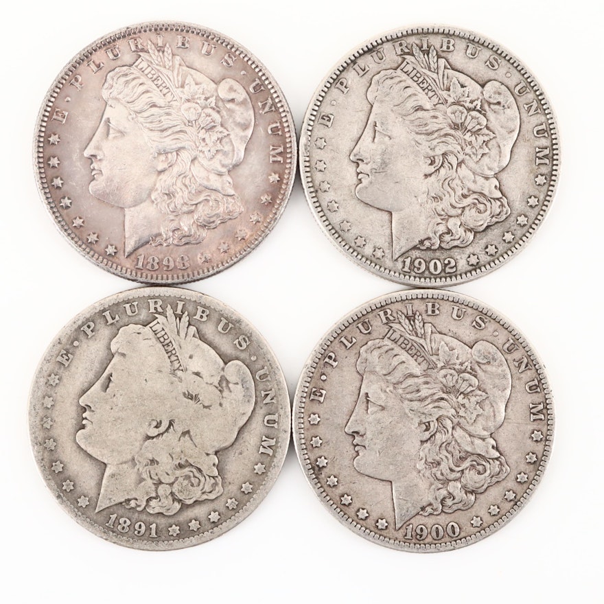 Four Silver Morgan Dollars Including an 1891-O