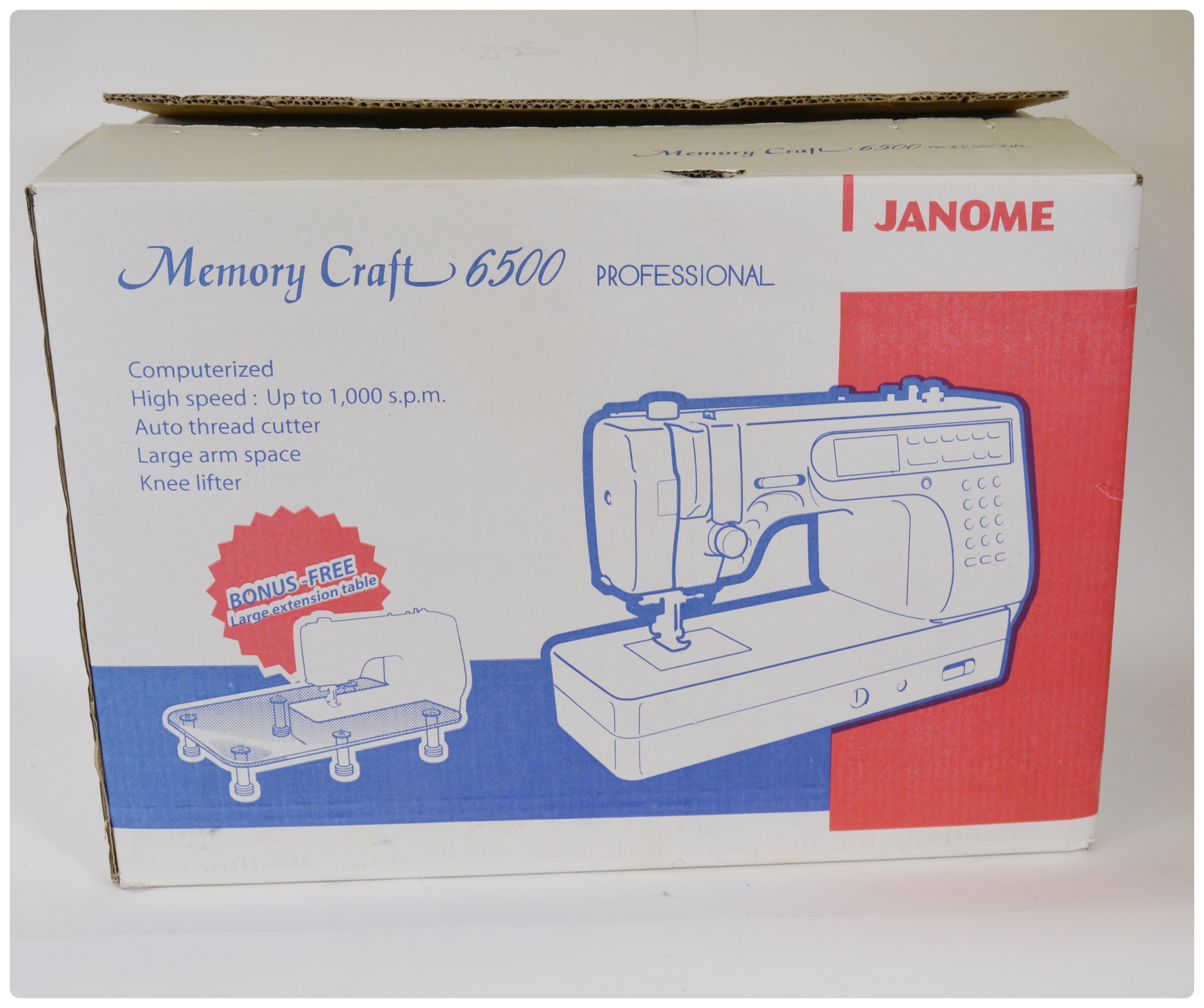 Janome Memory Craft 6500 Professional Sewing Machine and Extension Table