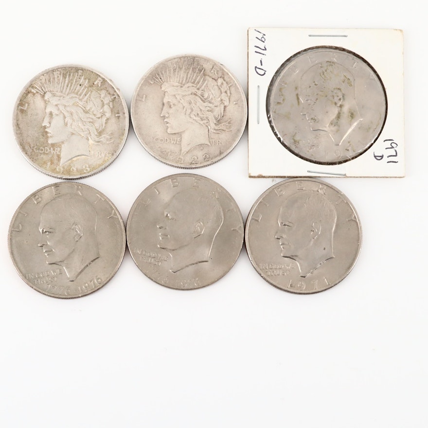 Four Eisenhower Dollars and Two Silver Peace Dollars