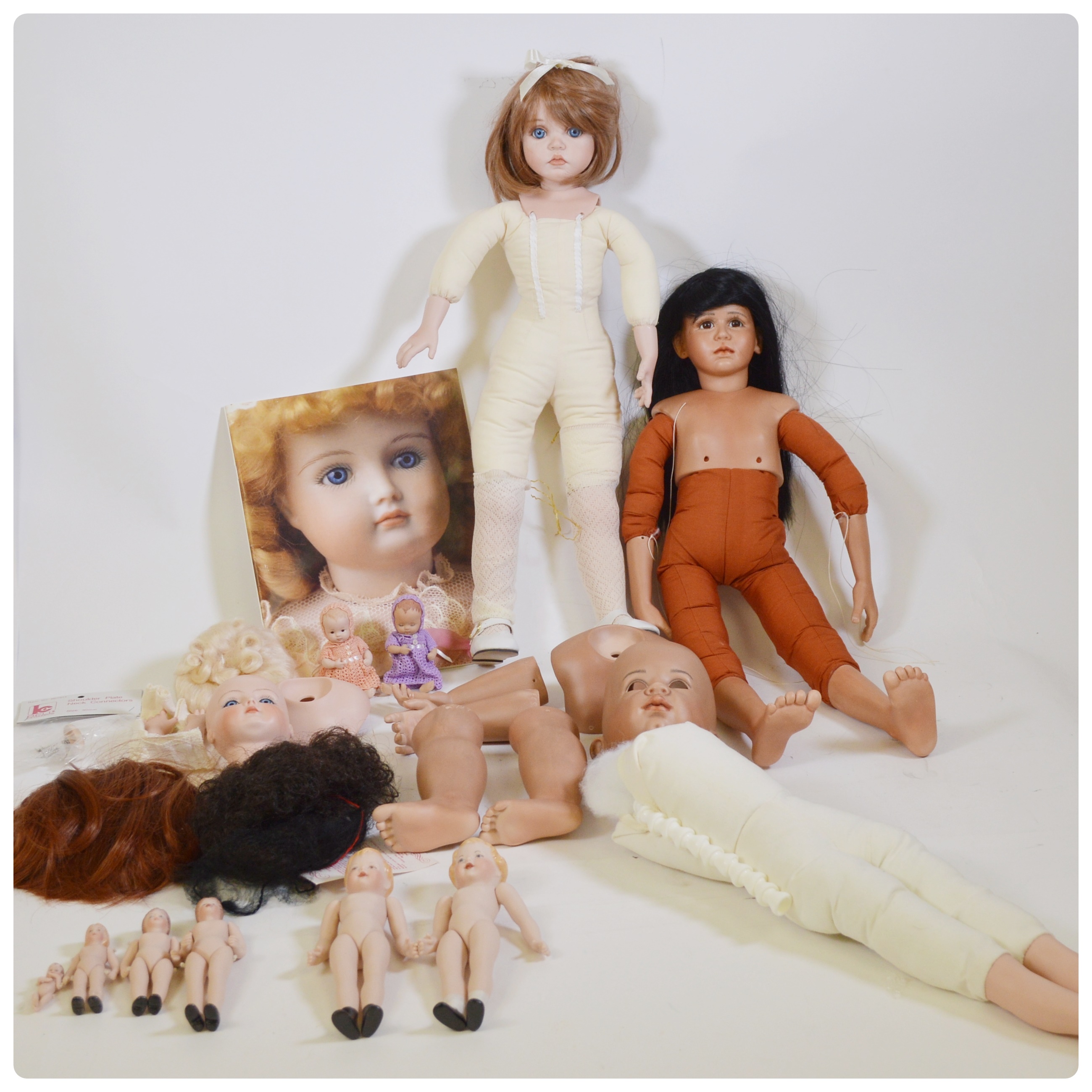 Vintage Porcelain Dolls and Doll Parts Including Bell Ceramics, Inc.