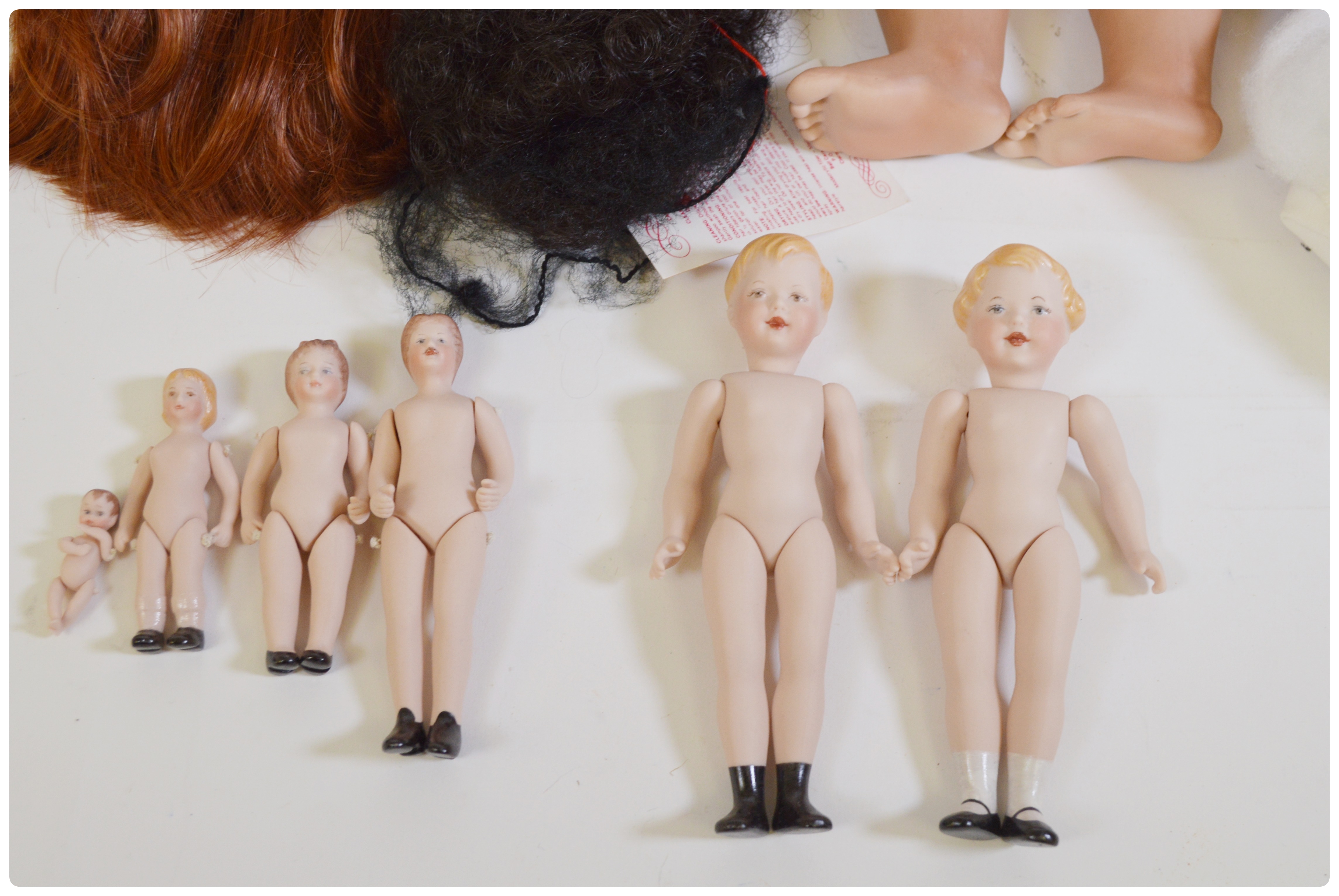 Vintage Porcelain Dolls and Doll Parts Including Bell Ceramics, Inc.