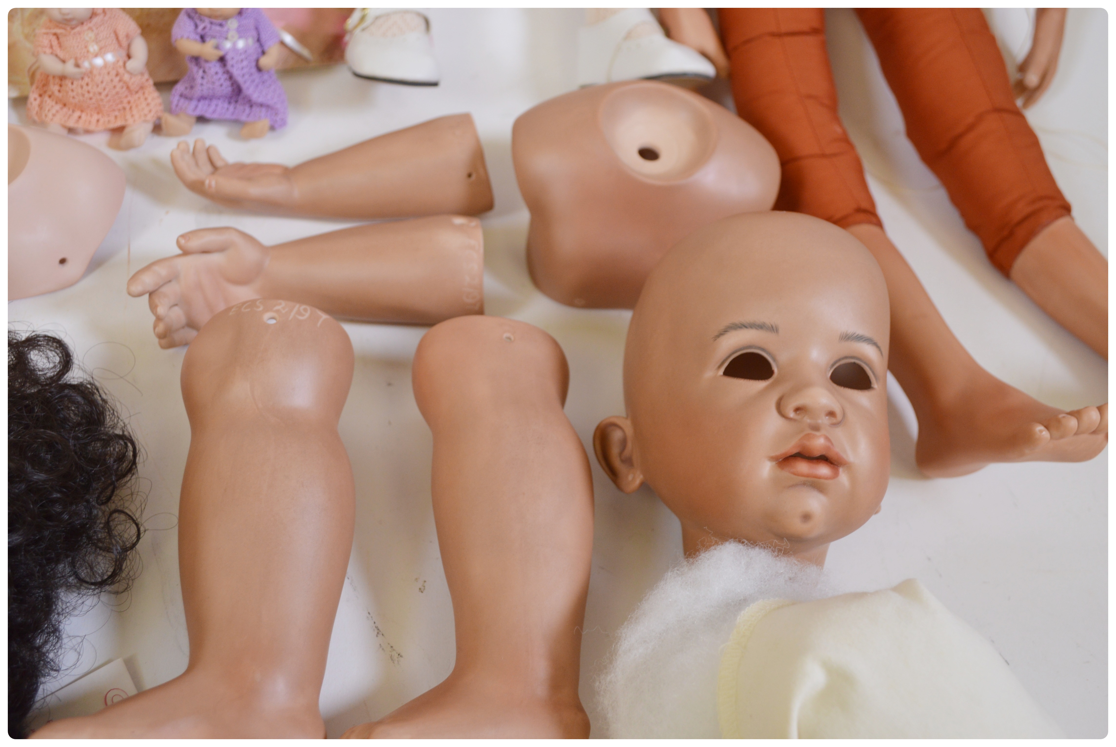 Vintage Porcelain Dolls and Doll Parts Including Bell Ceramics, Inc.