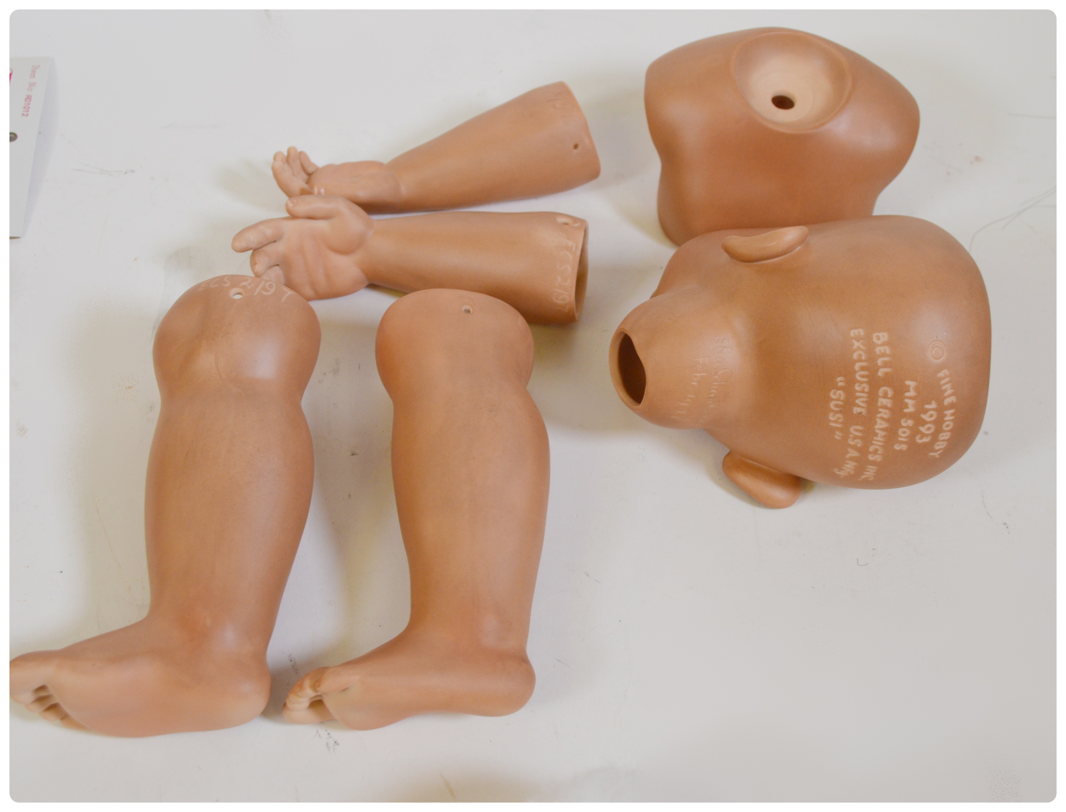 Vintage Porcelain Dolls and Doll Parts Including Bell Ceramics, Inc.