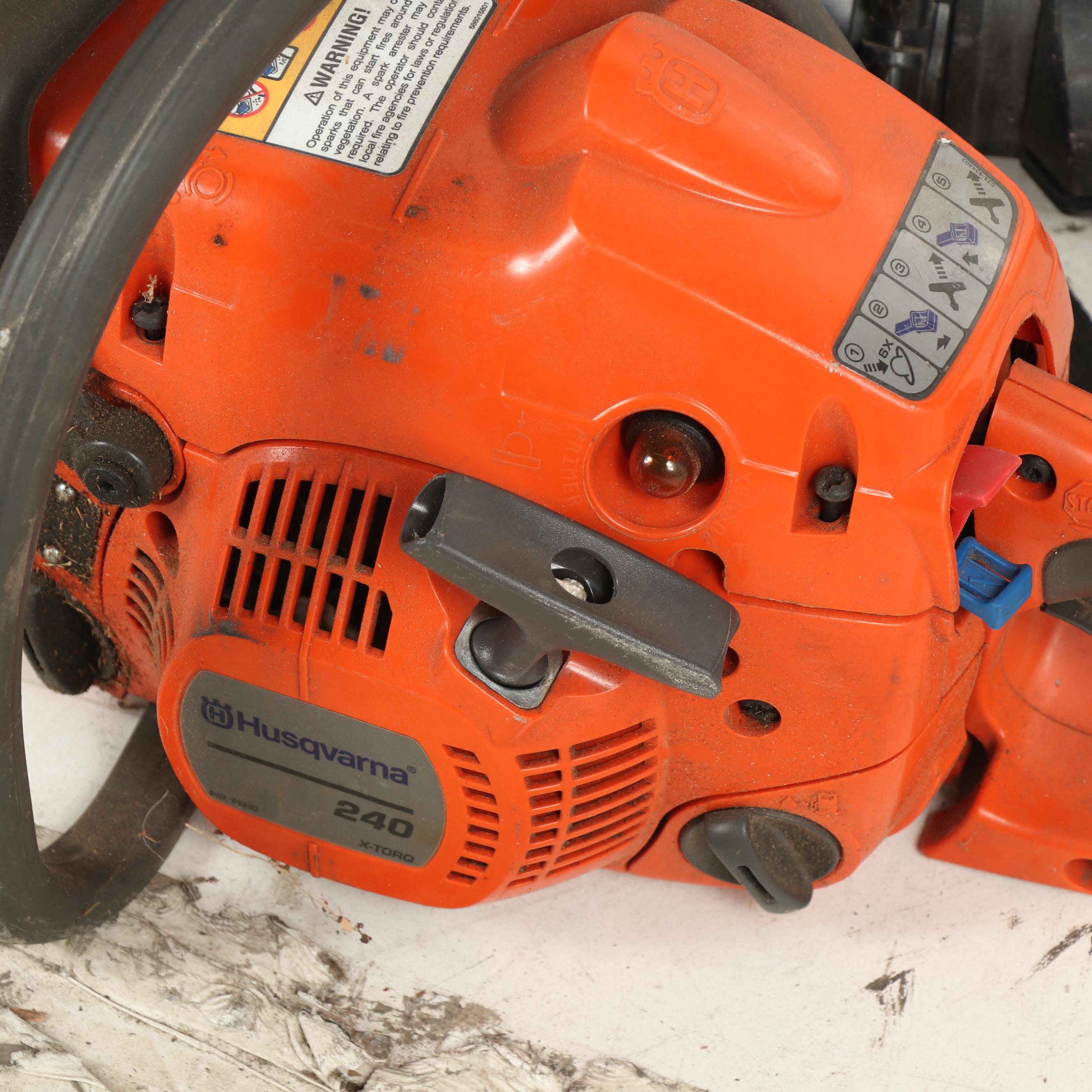 True Temper Wheel Barrow with Chainsaw and Leaf Blower
